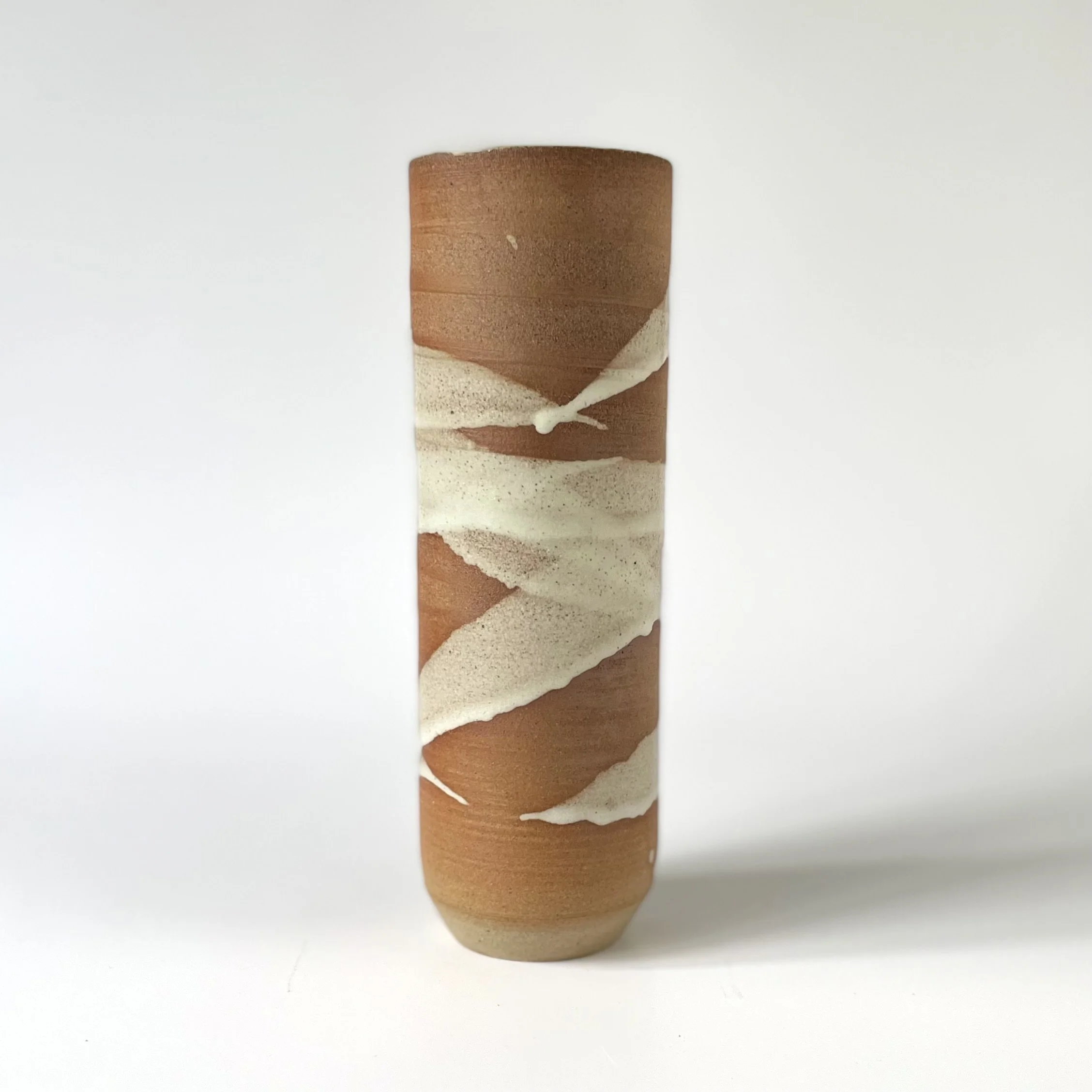 Small stoneeware vase glazed in white bamboo mark making 2