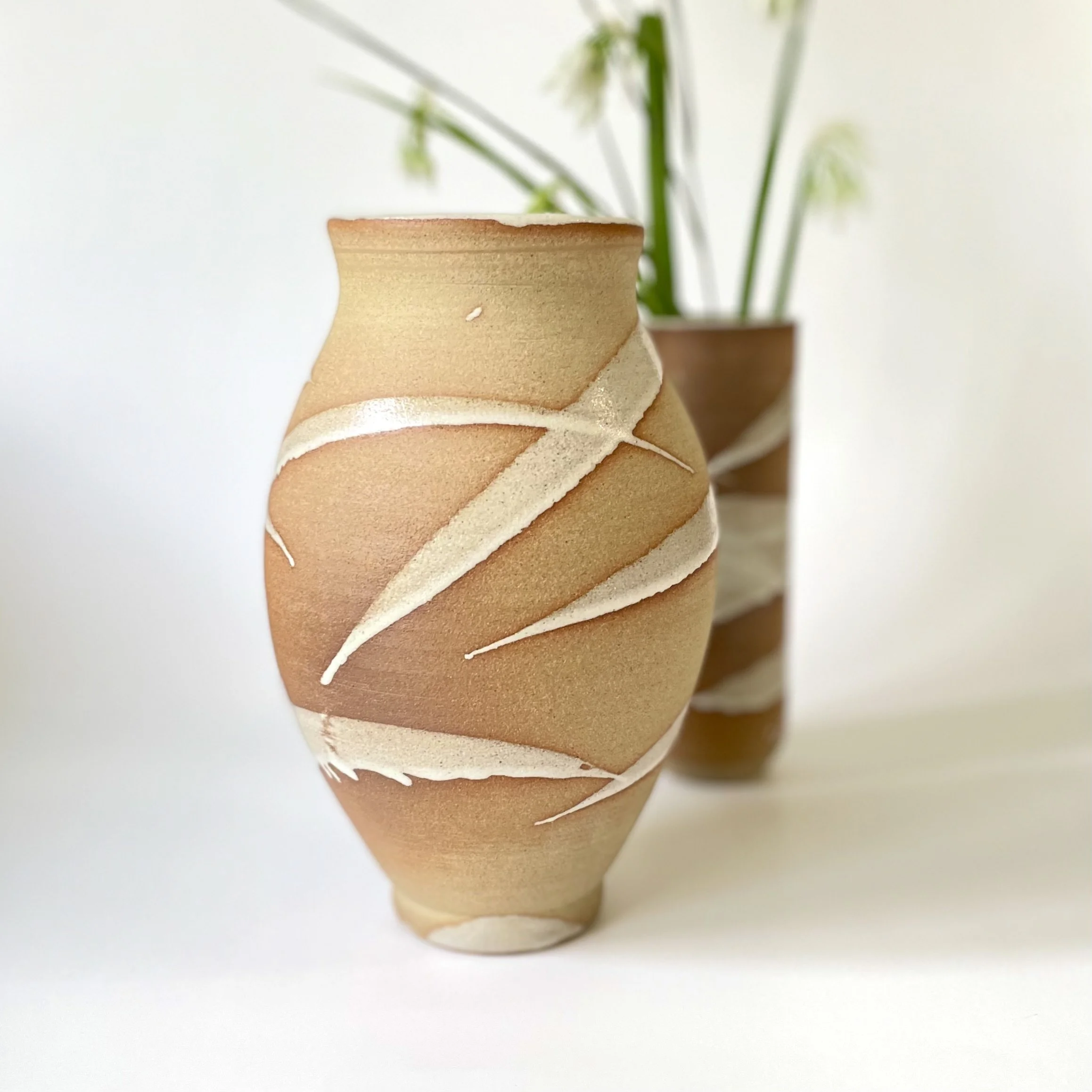 Stoneware vase glazed in white bamboo mark making 1