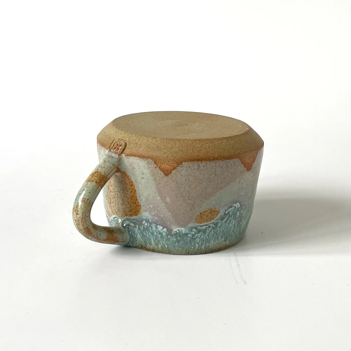 Small stoneware espresso cup in celadon and pink 3