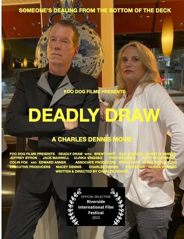 Poster for the movie Deadly Draw featuring two people standing with arms crossed, a man in a black jacket and a woman in a white blazer, with yellow text highlighting the film title and credits, and a black and white award emblem at the bottom.