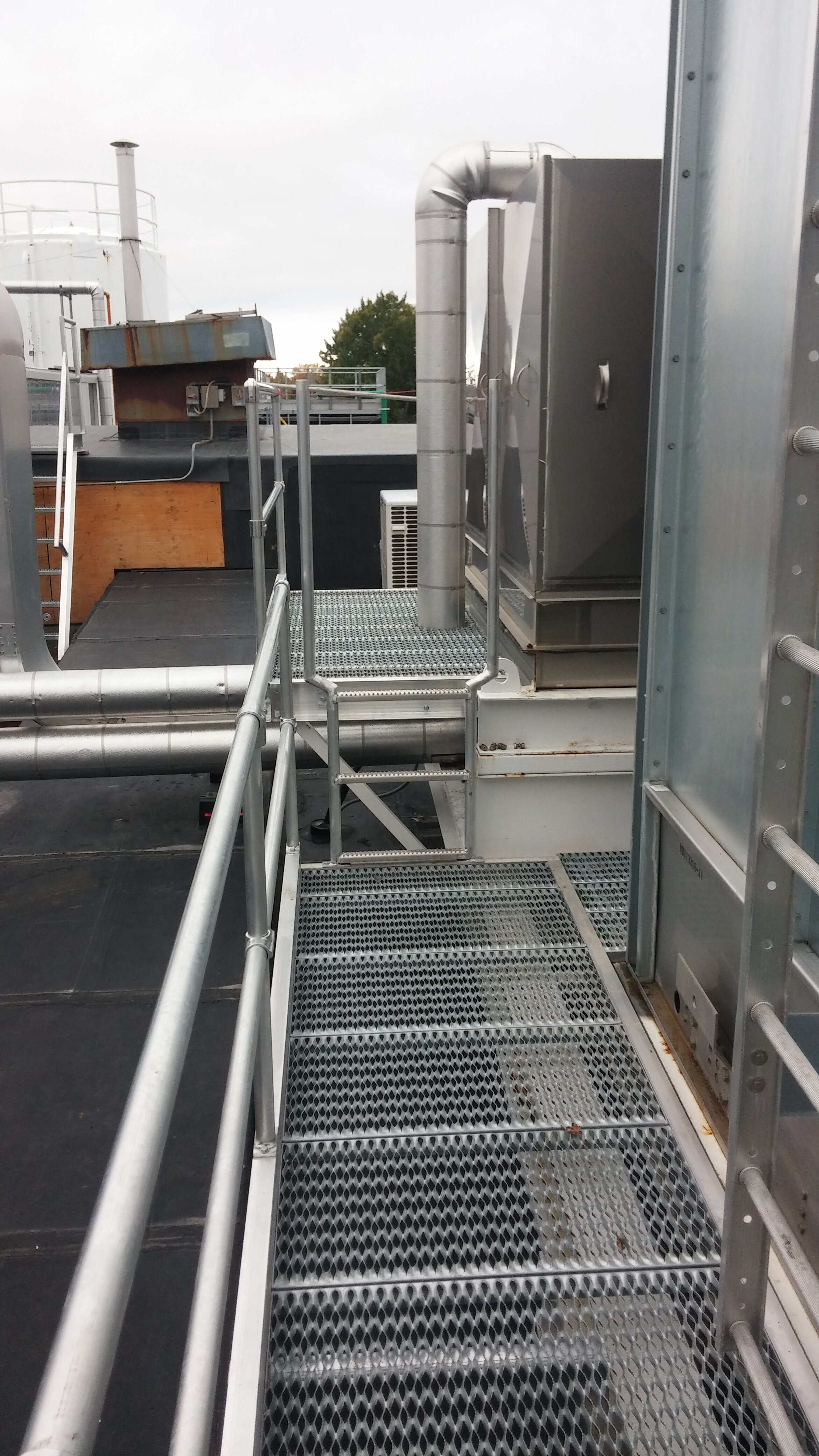 (16d) - View of access ladder to upper walkover off of cooling unit platform.jpg