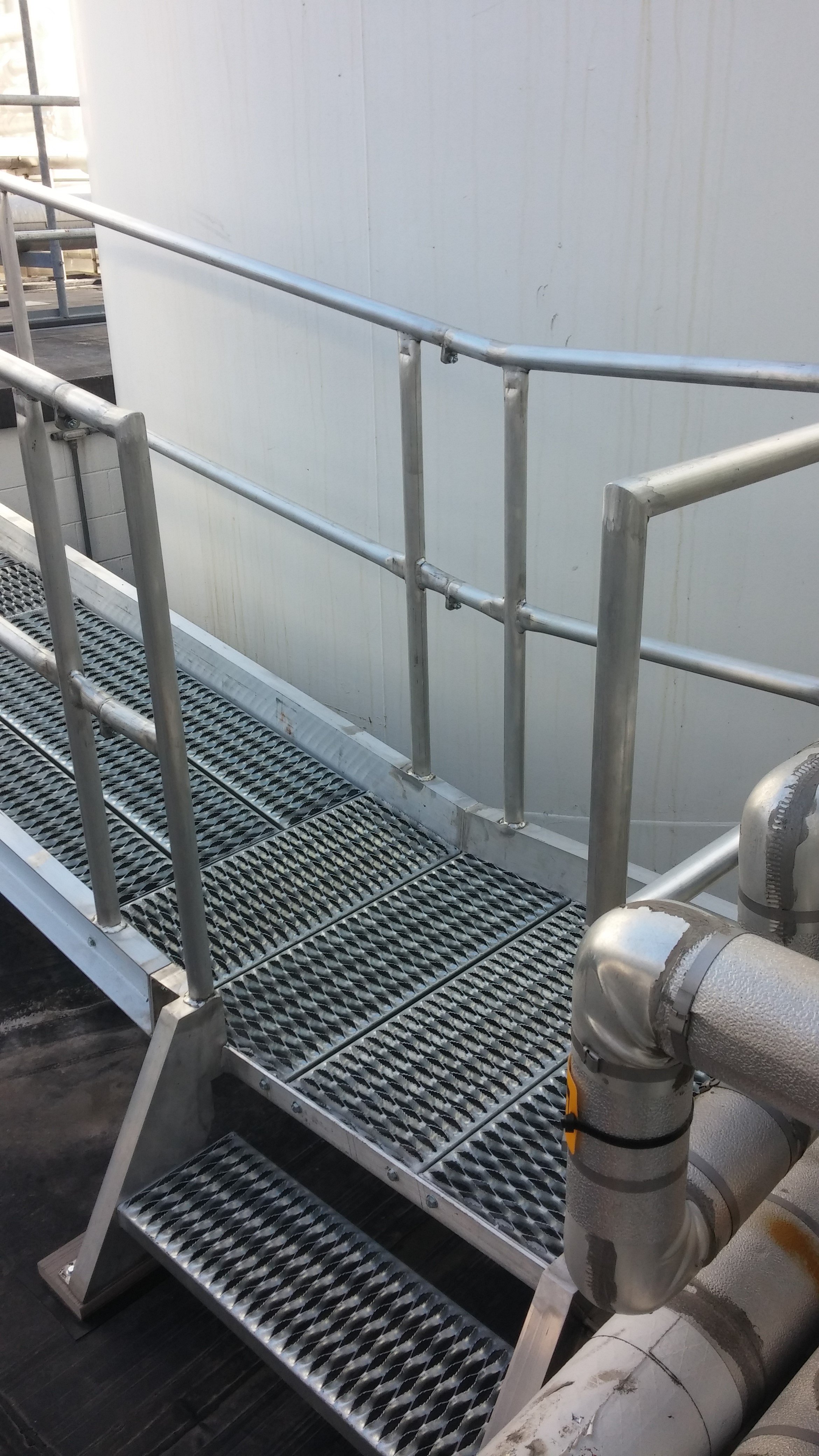 (10b) - Ramp fabricated out of aluminum channel & handrail, bolted assembly for easy installation & removal.jpg