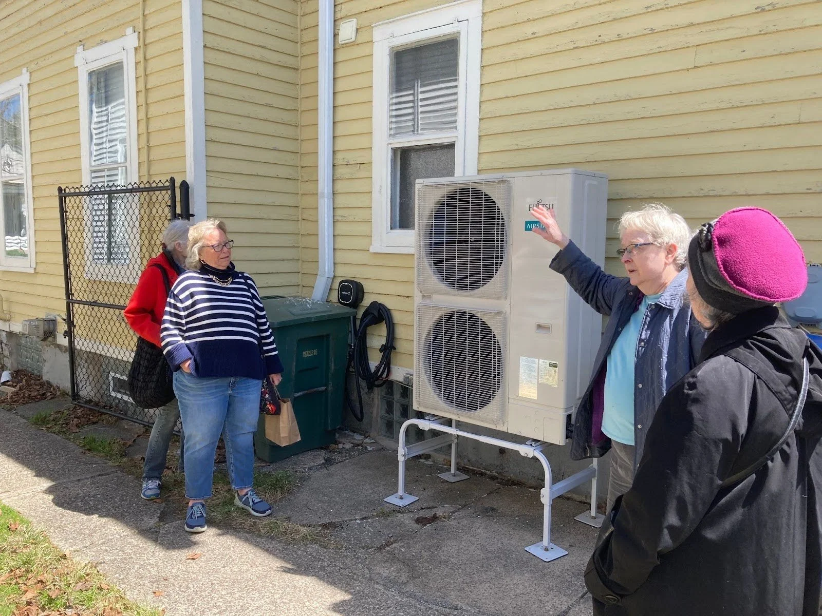 Green Orleans members on an all-electric home tour at Heidi Beutler’s Rochester home, April 2025.