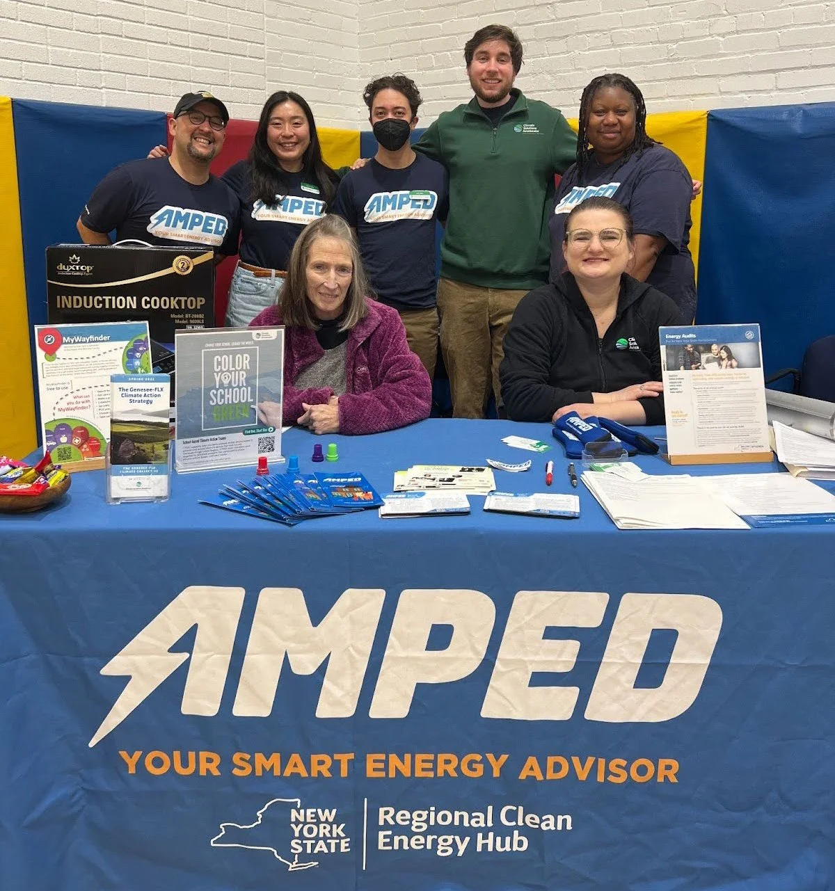 Accelerator staff with Lori Clark (NYSERDA), at the Health and Energy Fair at the Lewis Street YMCA in March 2025