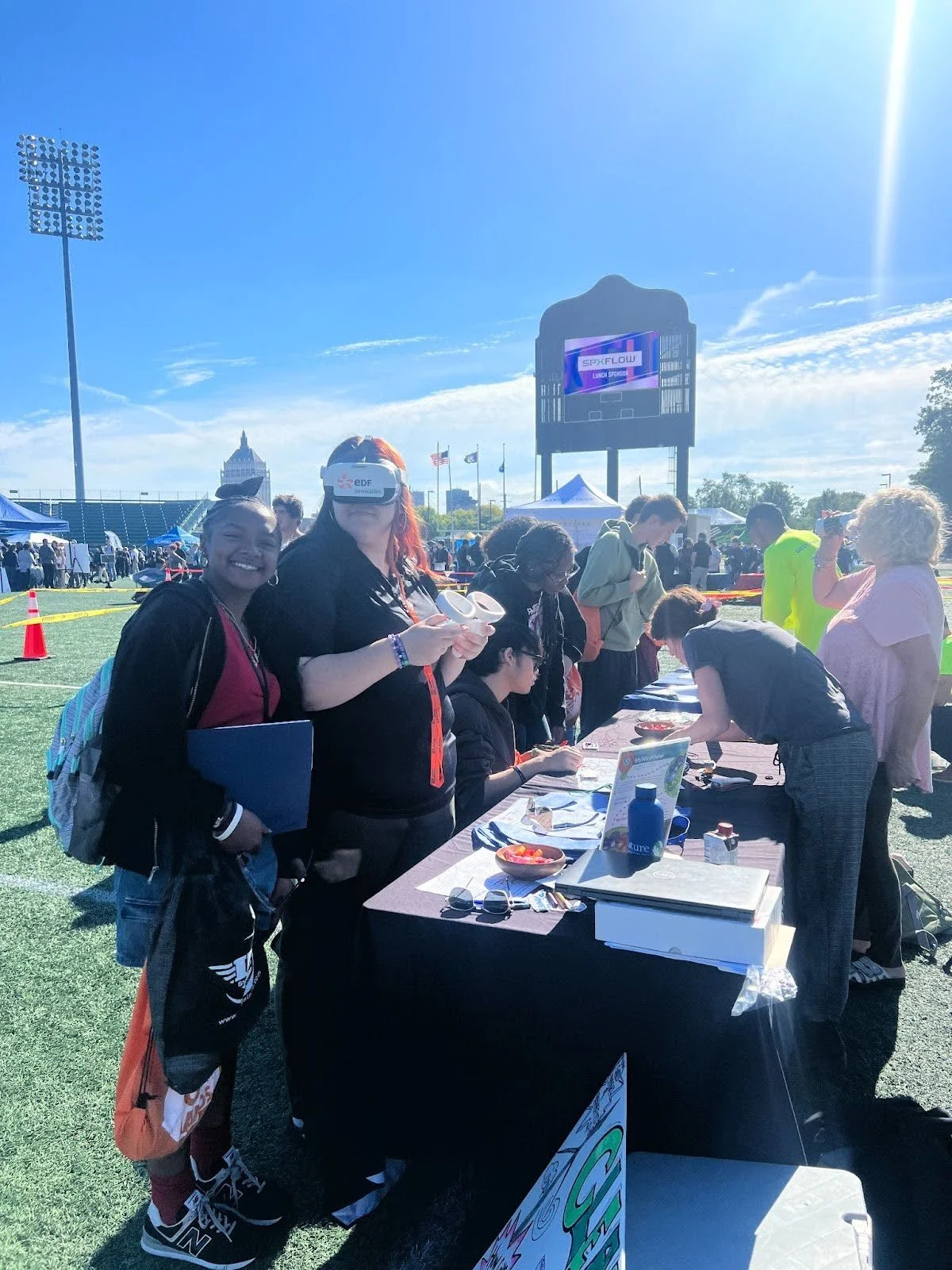 Community members exploring clean energy careers using EDF’s VR headset at ROC With Your Hands in October 2024.