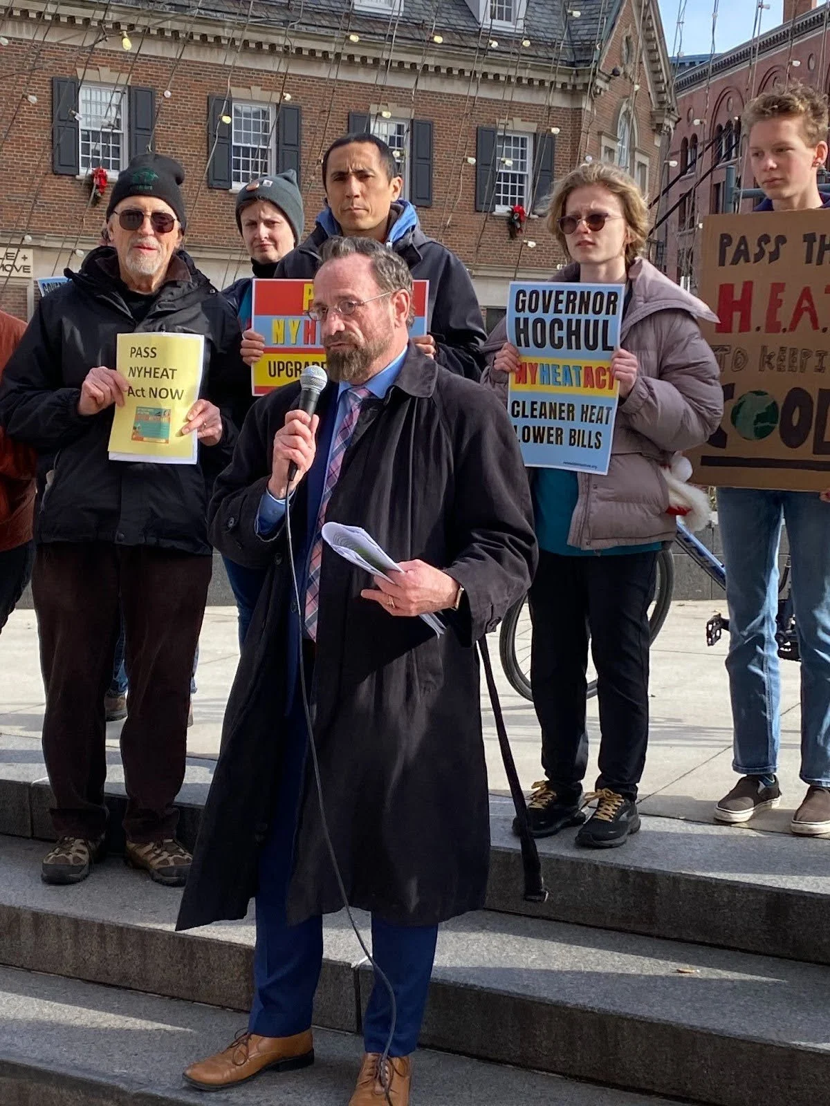 Assemblymember Harry Bronson and local climate advocates at a press conference in support of the NY HEAT Act, Rochester, December 2024.