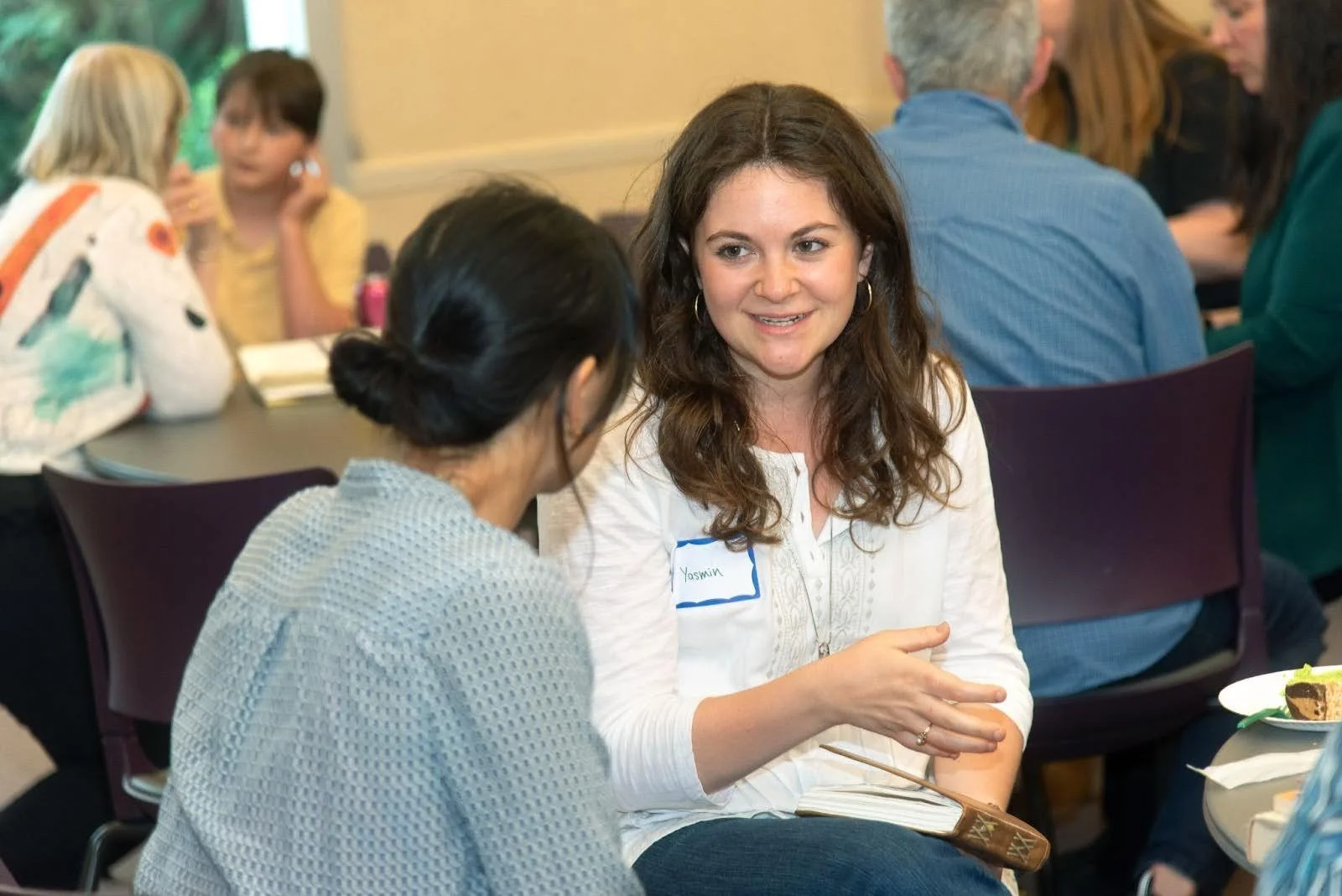 Participants in the May 2025 Regenerative Futures Lab interacting in pairs to explore and question the session’s “big idea” and build skills for co-creating a regenerative future