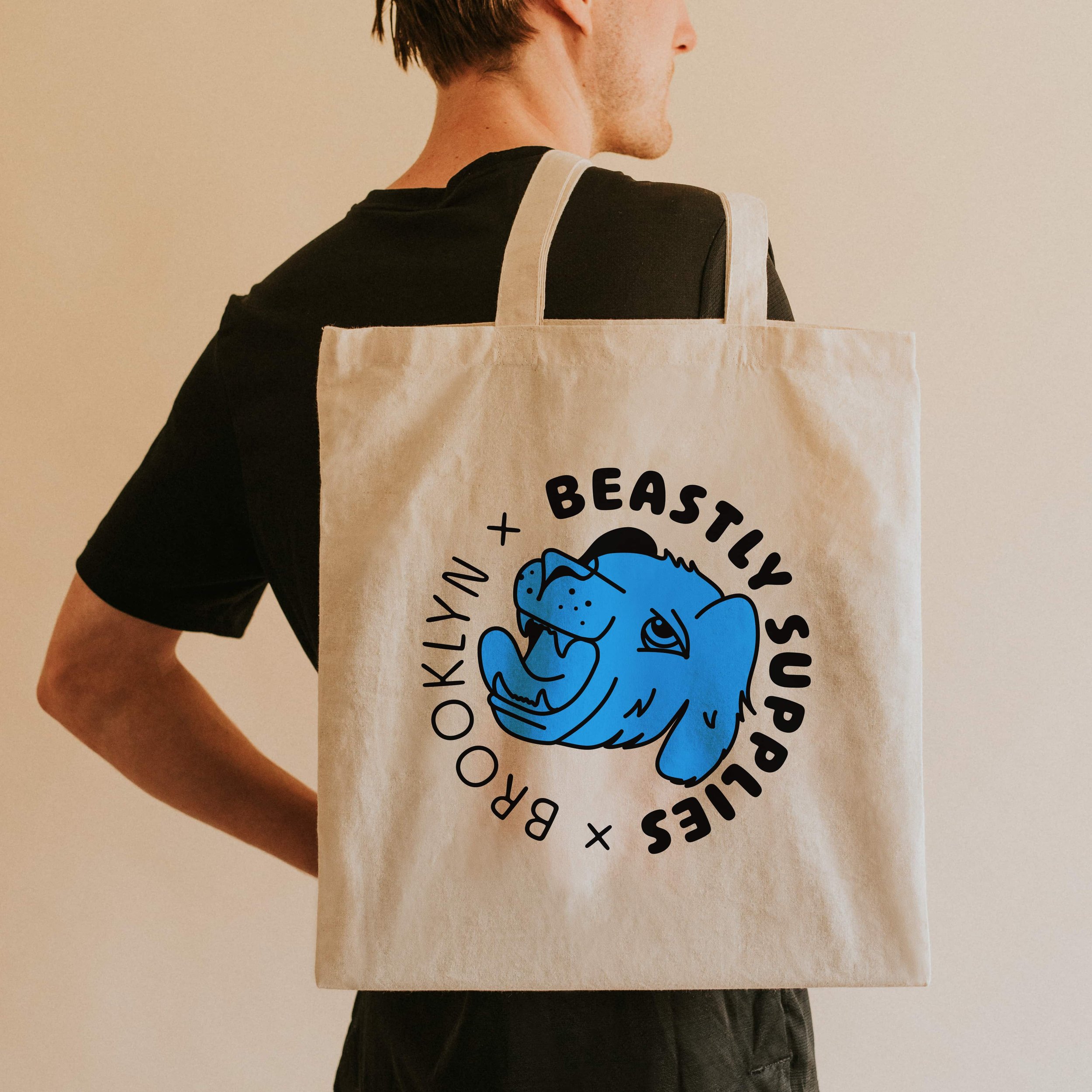 back-view-man-carrying-tote-bag.jpg