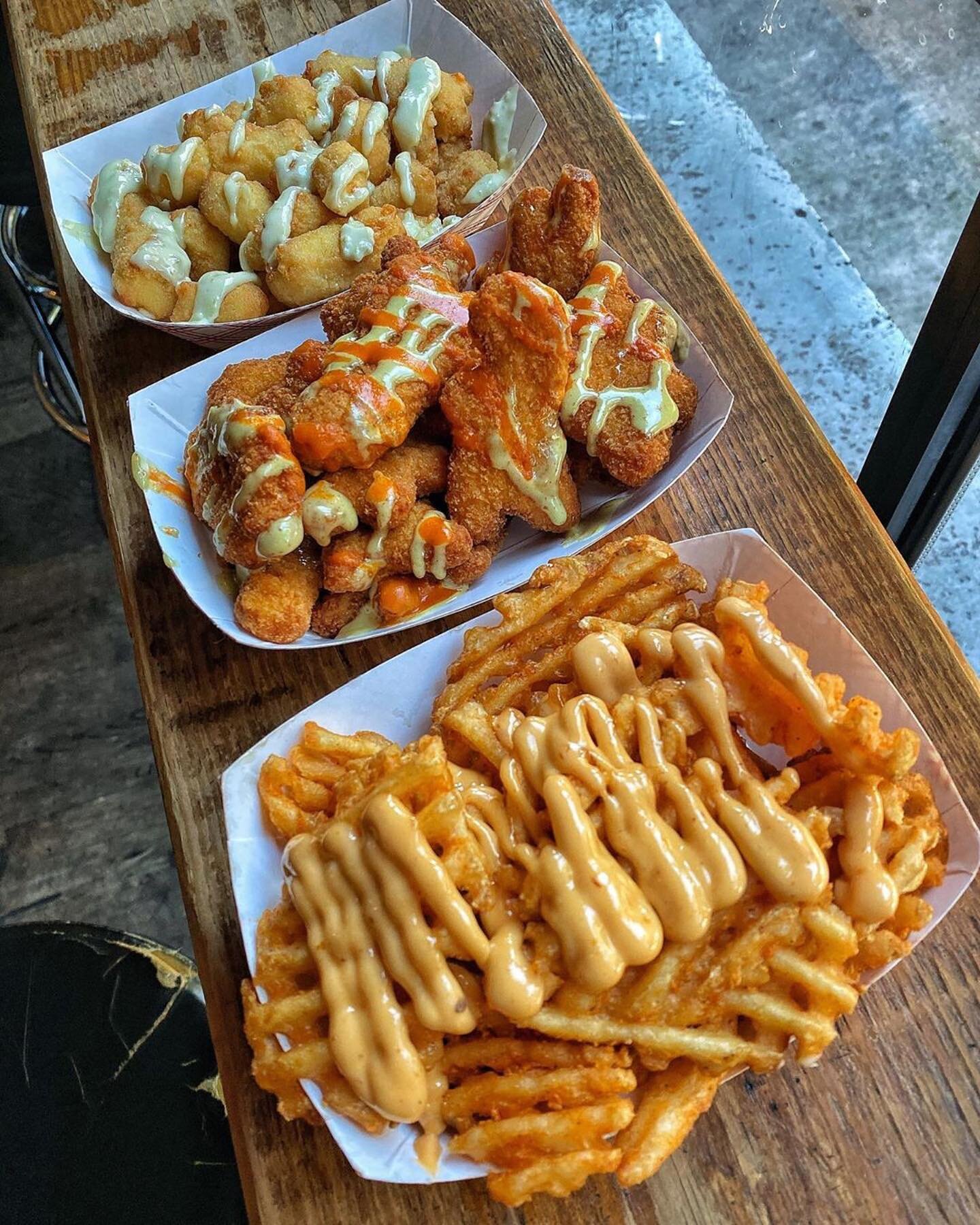 Why choose when you can have them all?! Waffle Fries, Dino Nuggs, and Tater Tots. Food of straight up CHAMPIONS. Get it delivered straight to your door! #ATTHEWALLACE