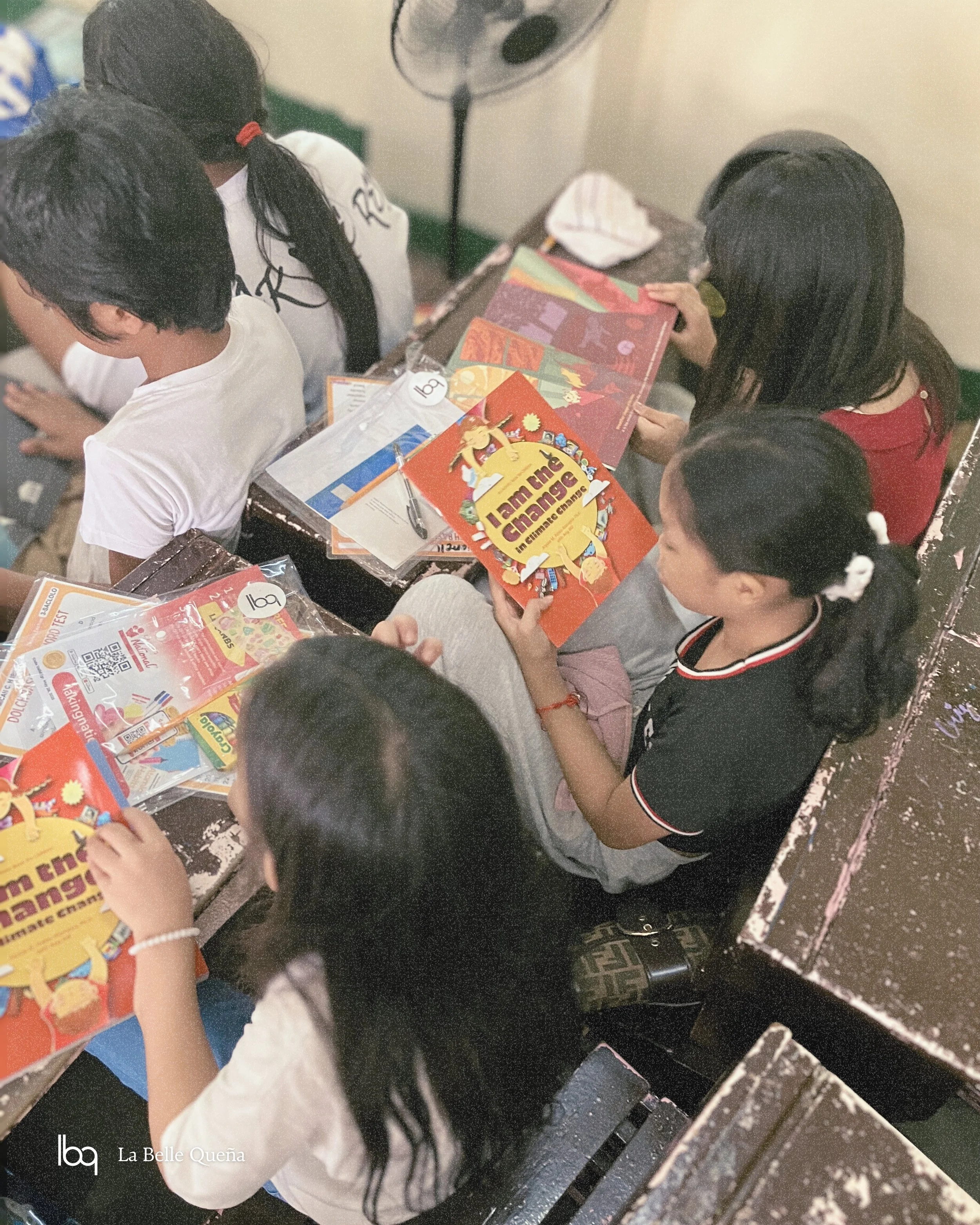 Parañaque kids appreciate the illustrations in their books