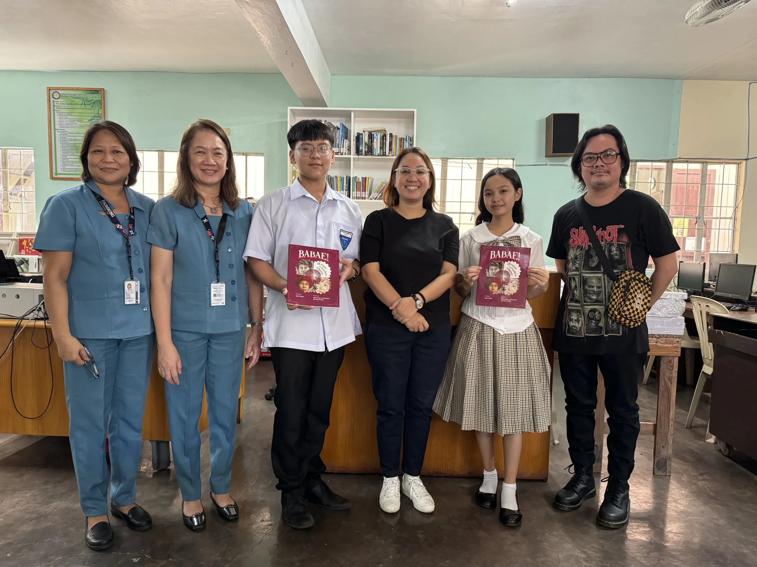 Artist Abi Dionisio partners with CANVAS to give books to Bulacan schools