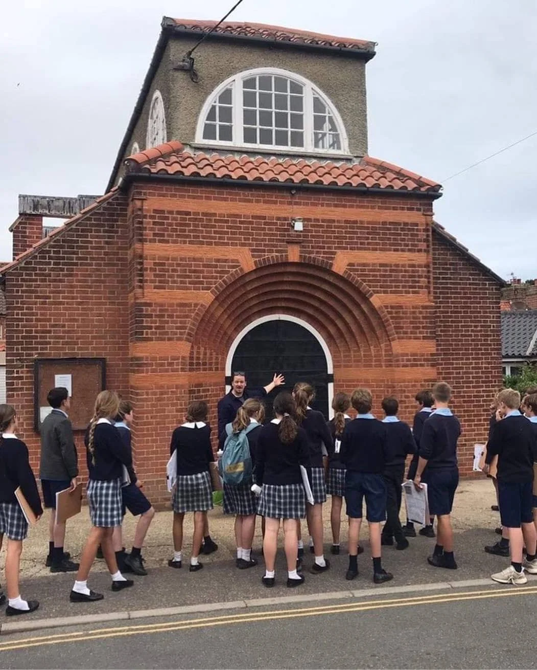 Photograph of schoolchildren taking part in an architectural short course