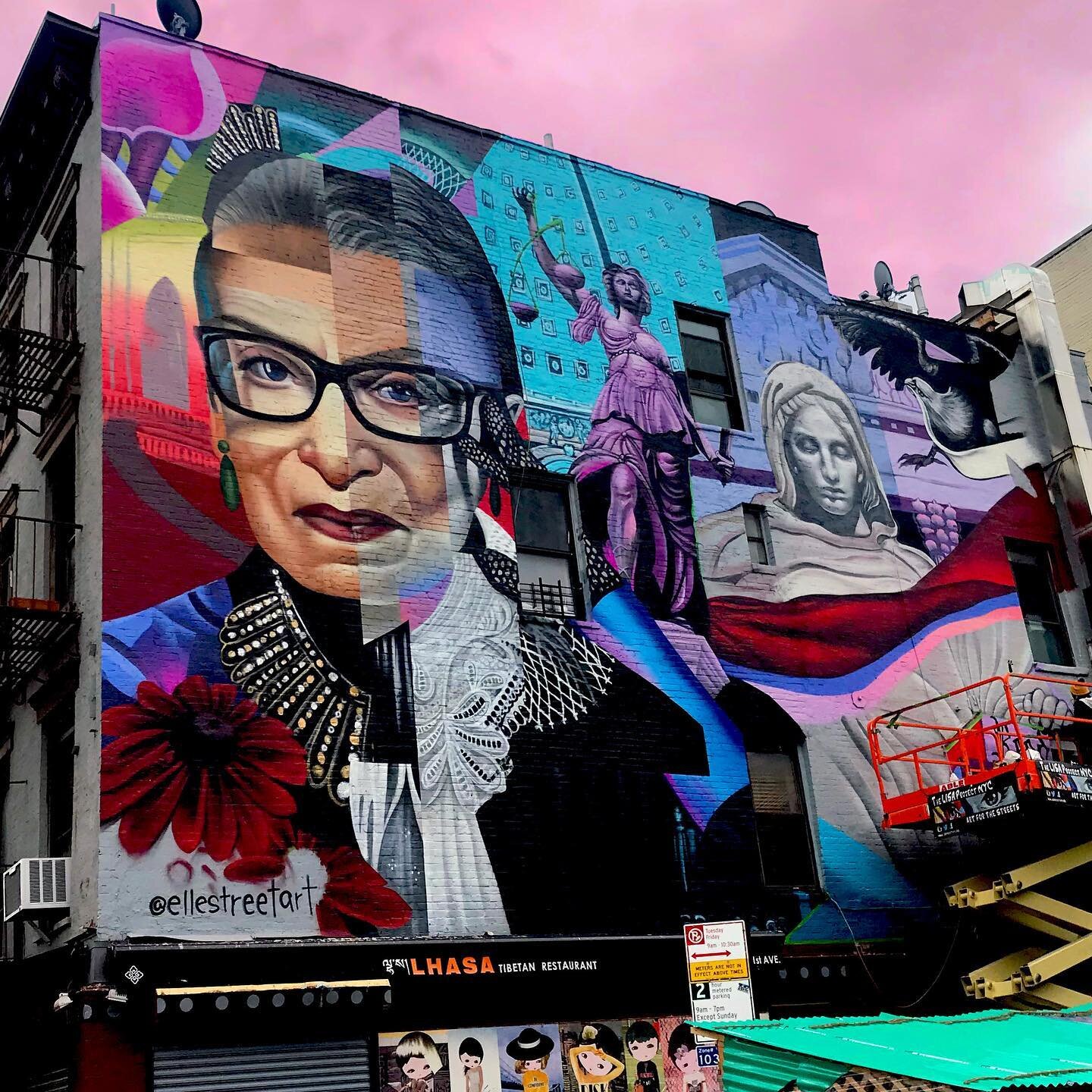 (Although not yet complete) I would like to take a minute to explain the significance of the imagery within the painting: RBG stands as the centrepiece of the mural adorned by an illustrated poem.

The Flowers to the bottom left are Black Eyed Susans