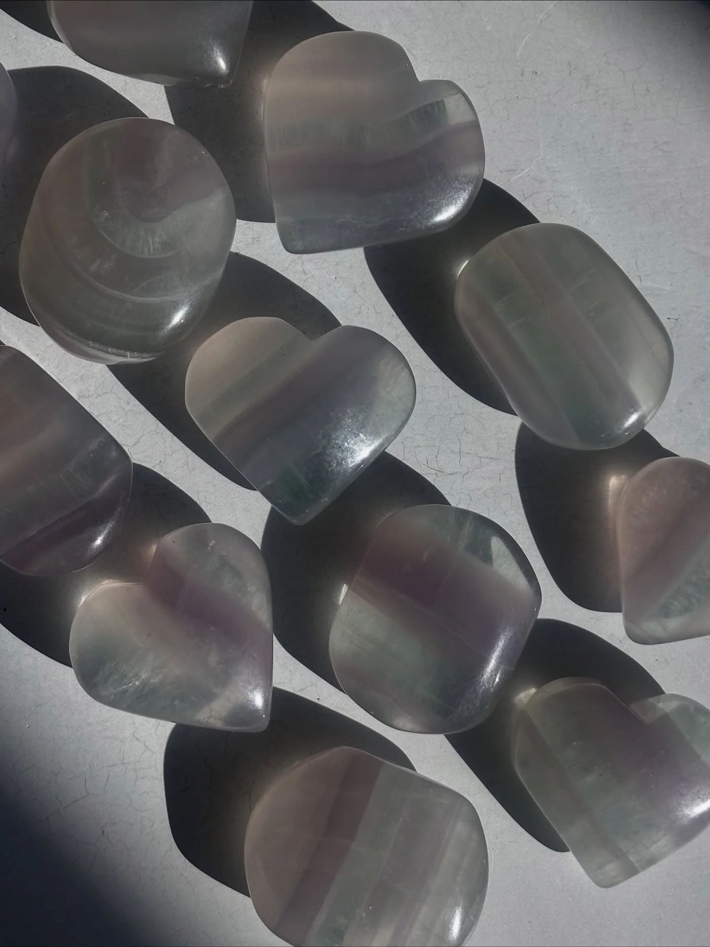 Fluorite spotlight! 💓✨ Picked these cuties up at gem show and couldn&rsquo;t wait to share them with you. 

✨ Yttrium Fluorite Hearts and Palm Stones
✨ Rainbow Fluorite Half-Polished Towers

Available during our upcoming Story Sale on Tuesday, 11/4 