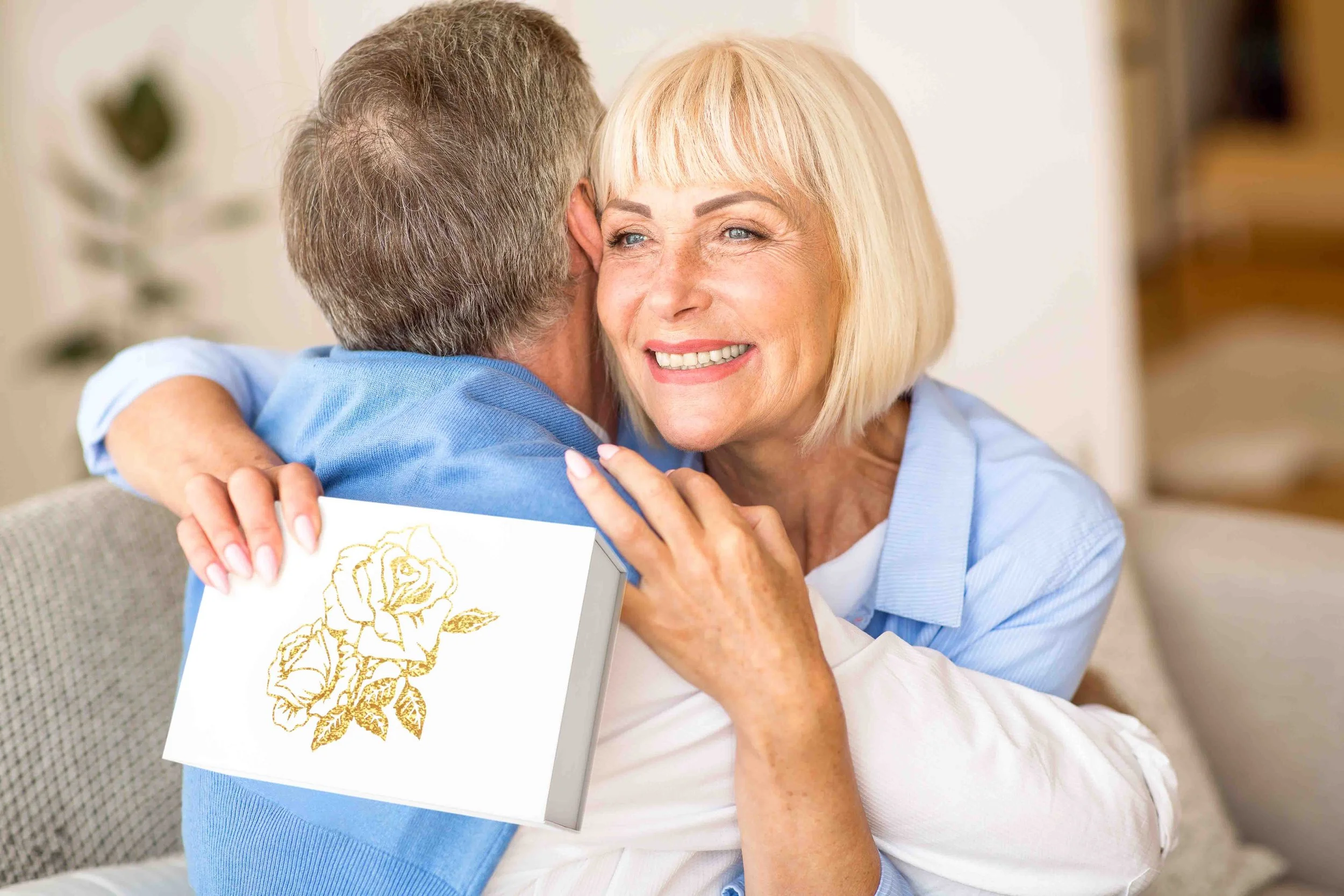 happy-wife-hugging-husband-for-the-present-2021-08-30-02-12-24-utc (1).jpg