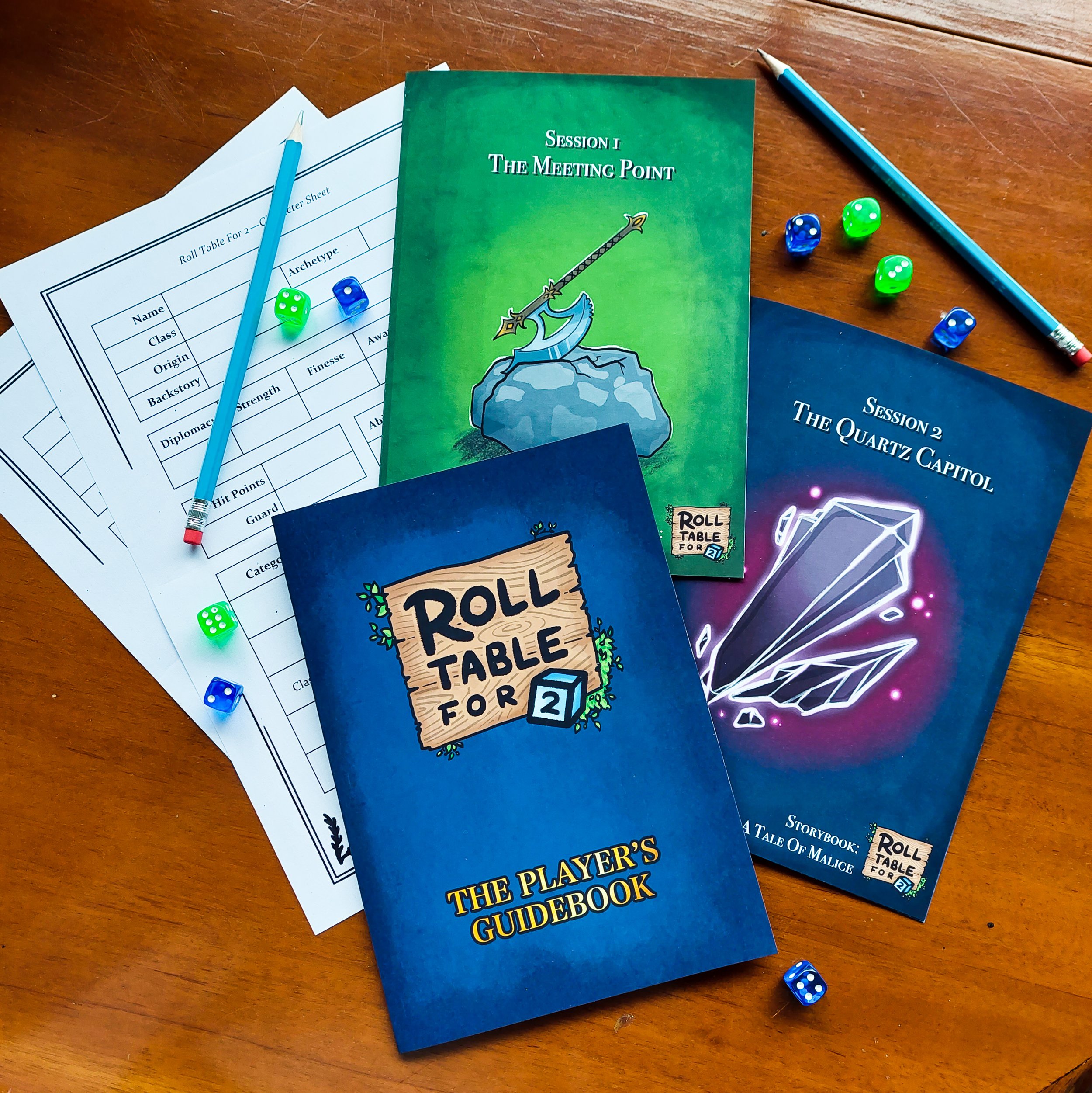 2 player Tabletop RPG materials including rulebooks, session guides, character sheets, a pencil, and dice.