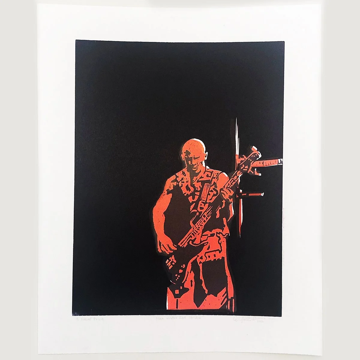 Silhouette of a soldier playing a guitar against a black background