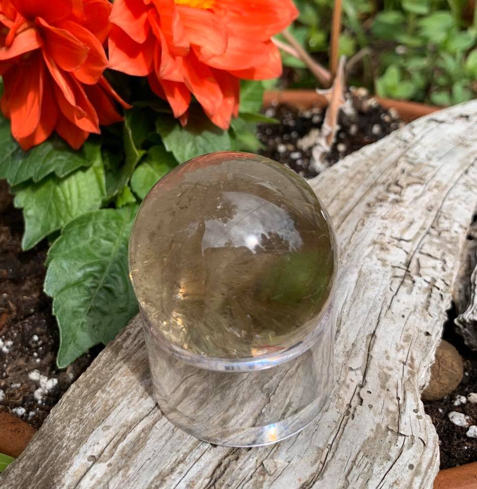 1.5 2 inch smoky quartz sphere.jpg