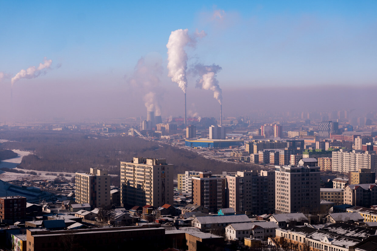 Skyline of Ulaanbaatar, Mongolia, showing the air pollution caused by 4 coal-fired power plants currently providing power to the city.