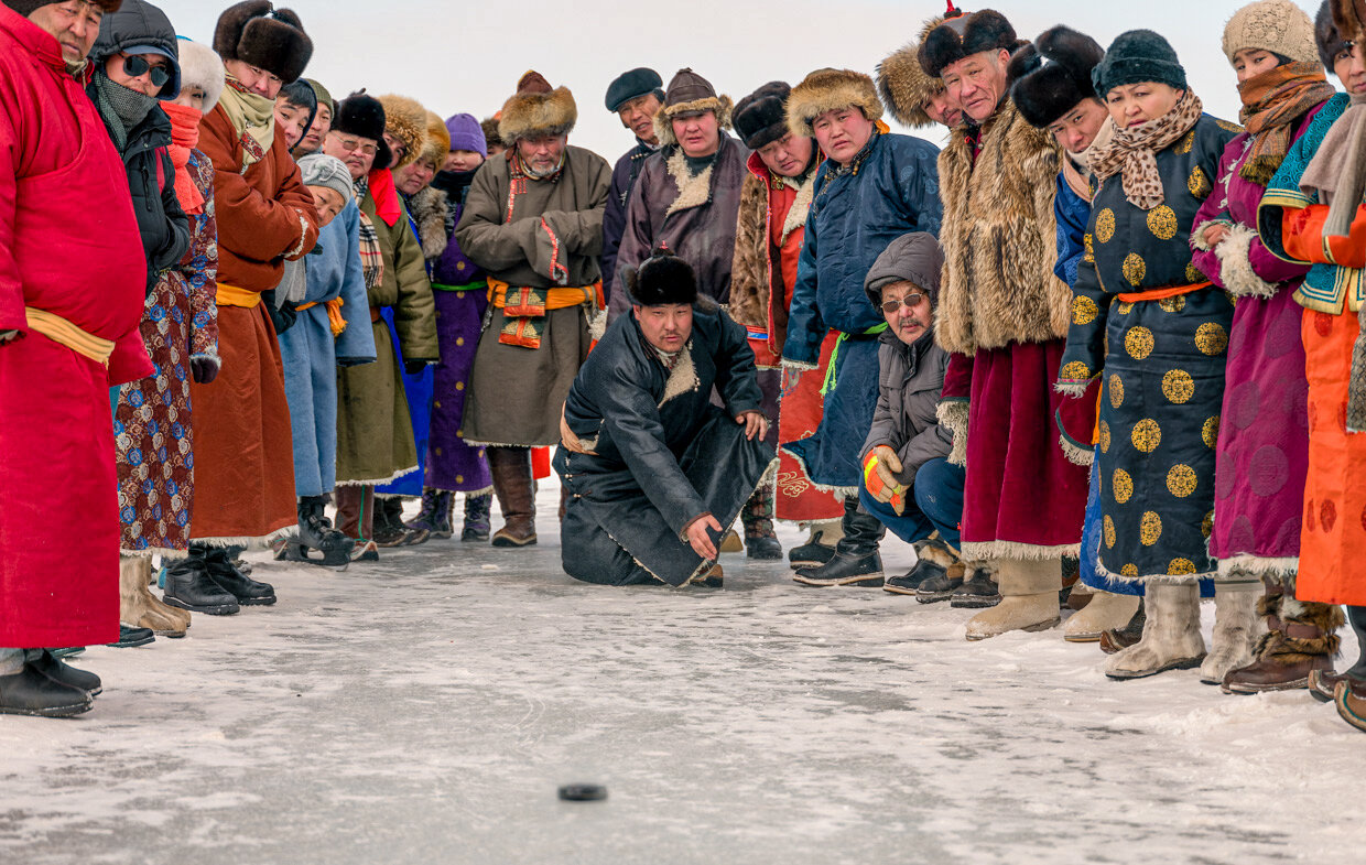 Local community celebrating the recovery of their lake from destruction by a mining company with an ice festival on the frozen Ulaan Nuur.