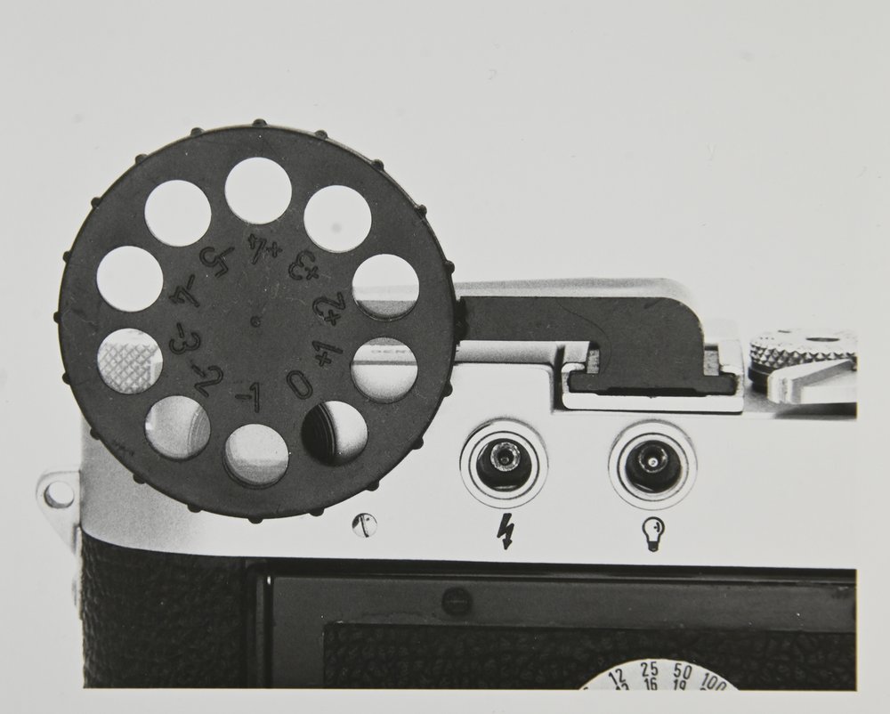 The Leitz DIOOY corrective eyepiece selection device for dealers, mounted on a Leica M.jpg