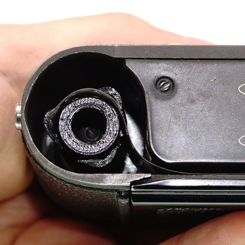 Ausgeknips quick-oading take-up spool  in a Leica M..jpg