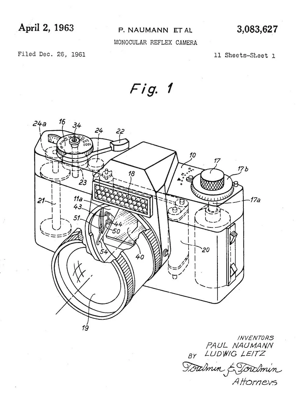Leicaflex Patent illustration filed in 1961 shows SLR with built-in non-TTL meterimg system, traditional rewind knob..jpeg