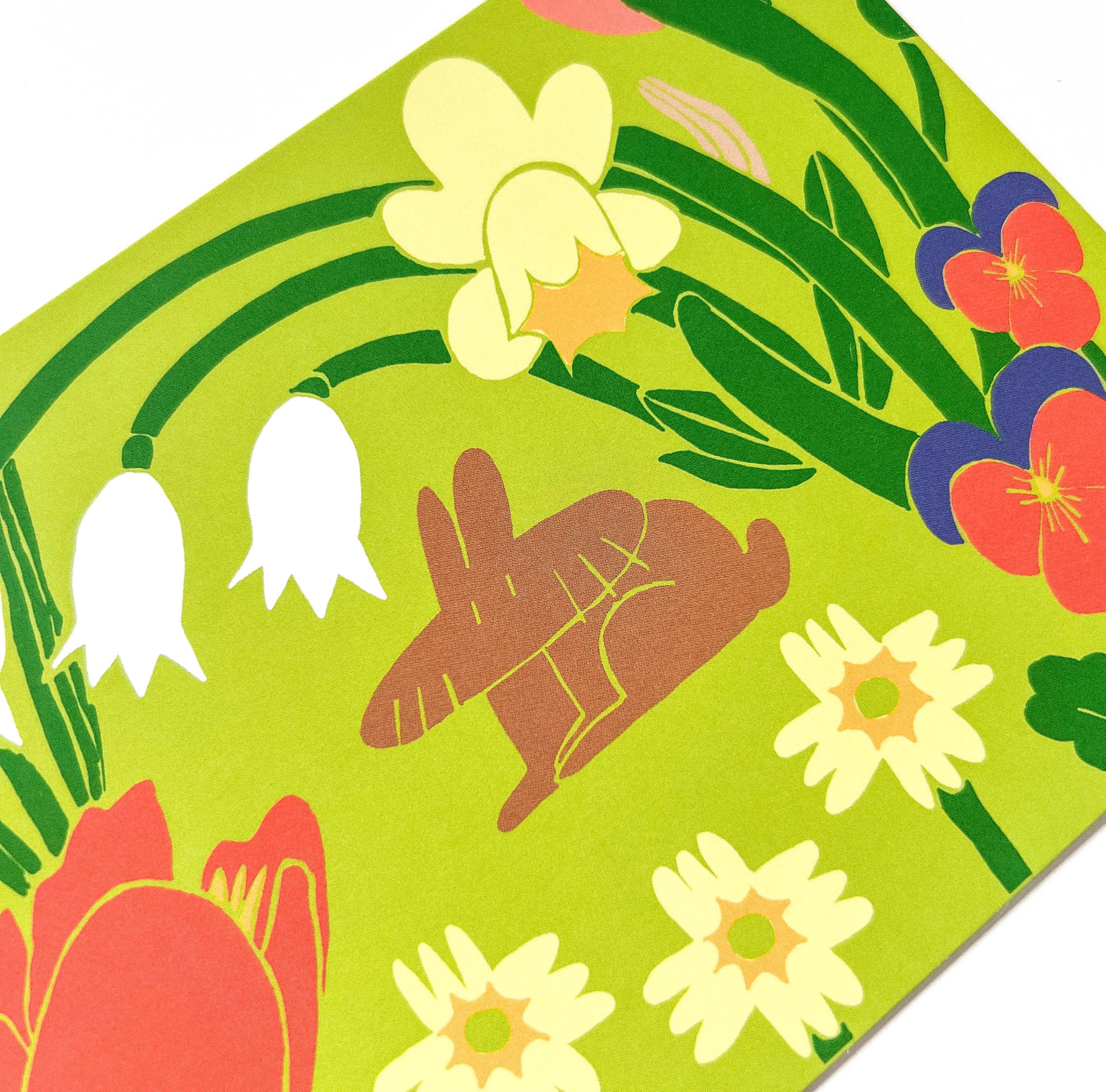 Single A6 card from “The Blooming Spring Realm” bundle with a lush green background. A brown rabbit nestles among spring flowers in a soft, nature-inspired scene.