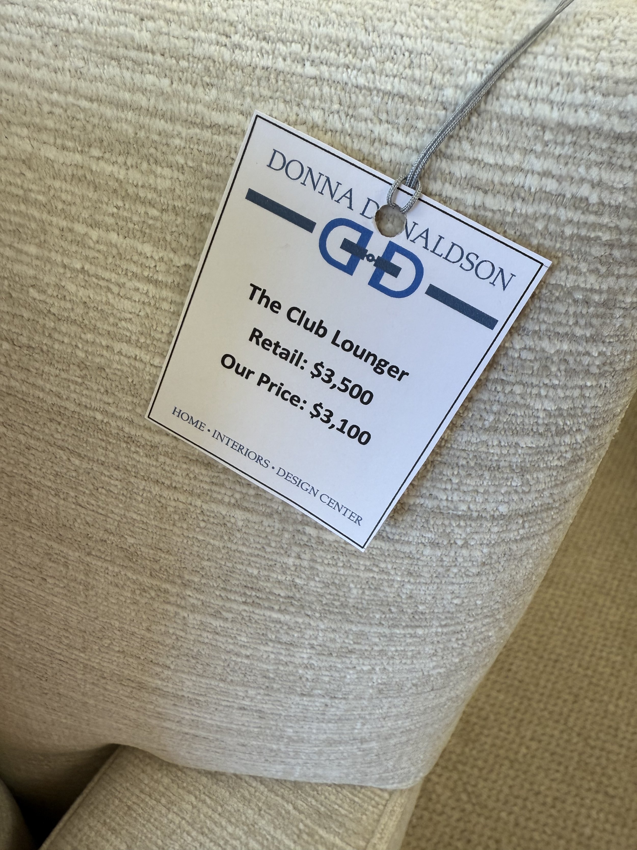 $3100 Club Lounger Swivel Chair with neutral textured fabric, available at Donna Donaldson Interiors.