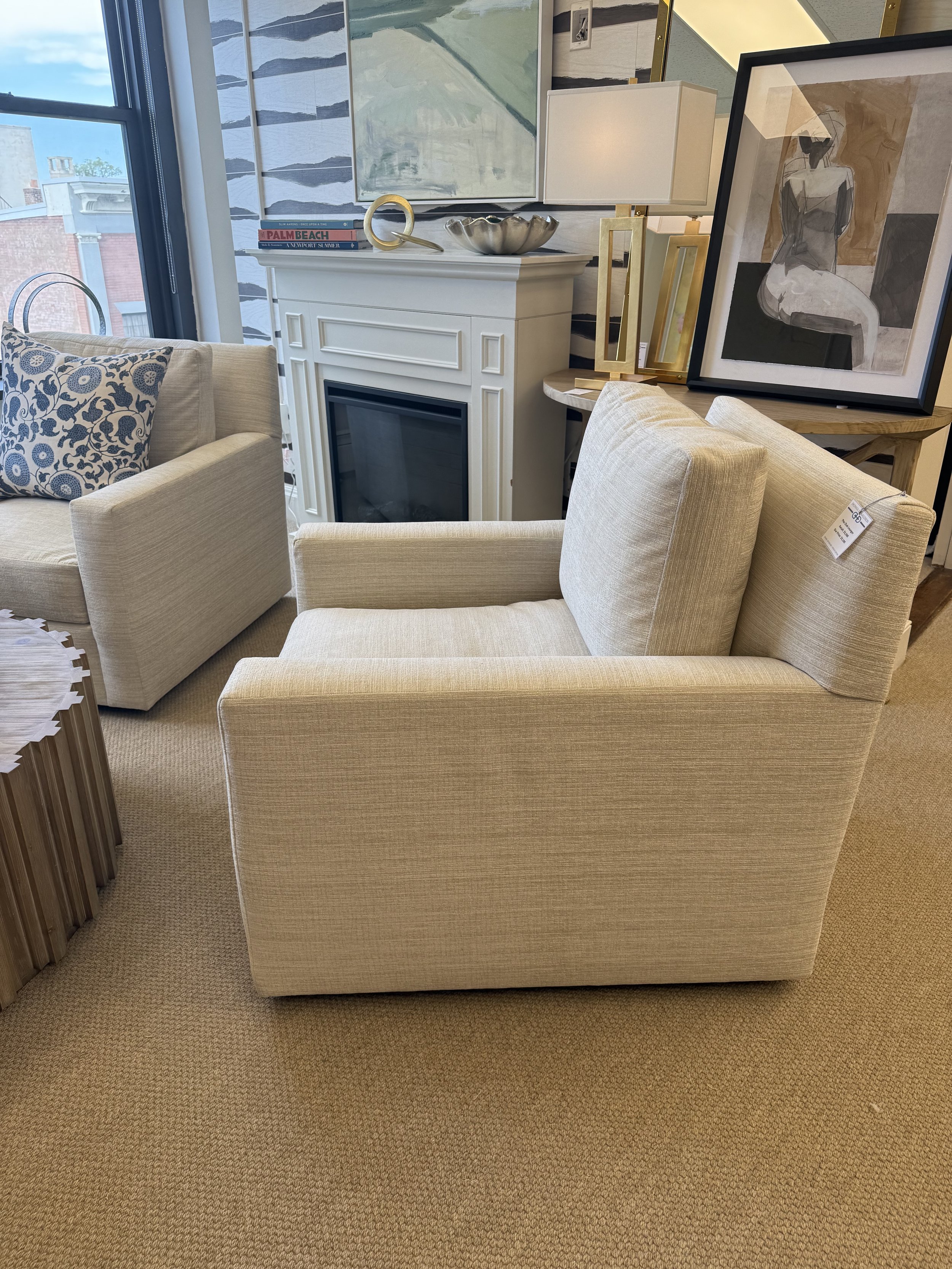 Club Lounger Swivel Chair with neutral textured fabric, available at Donna Donaldson Interiors.