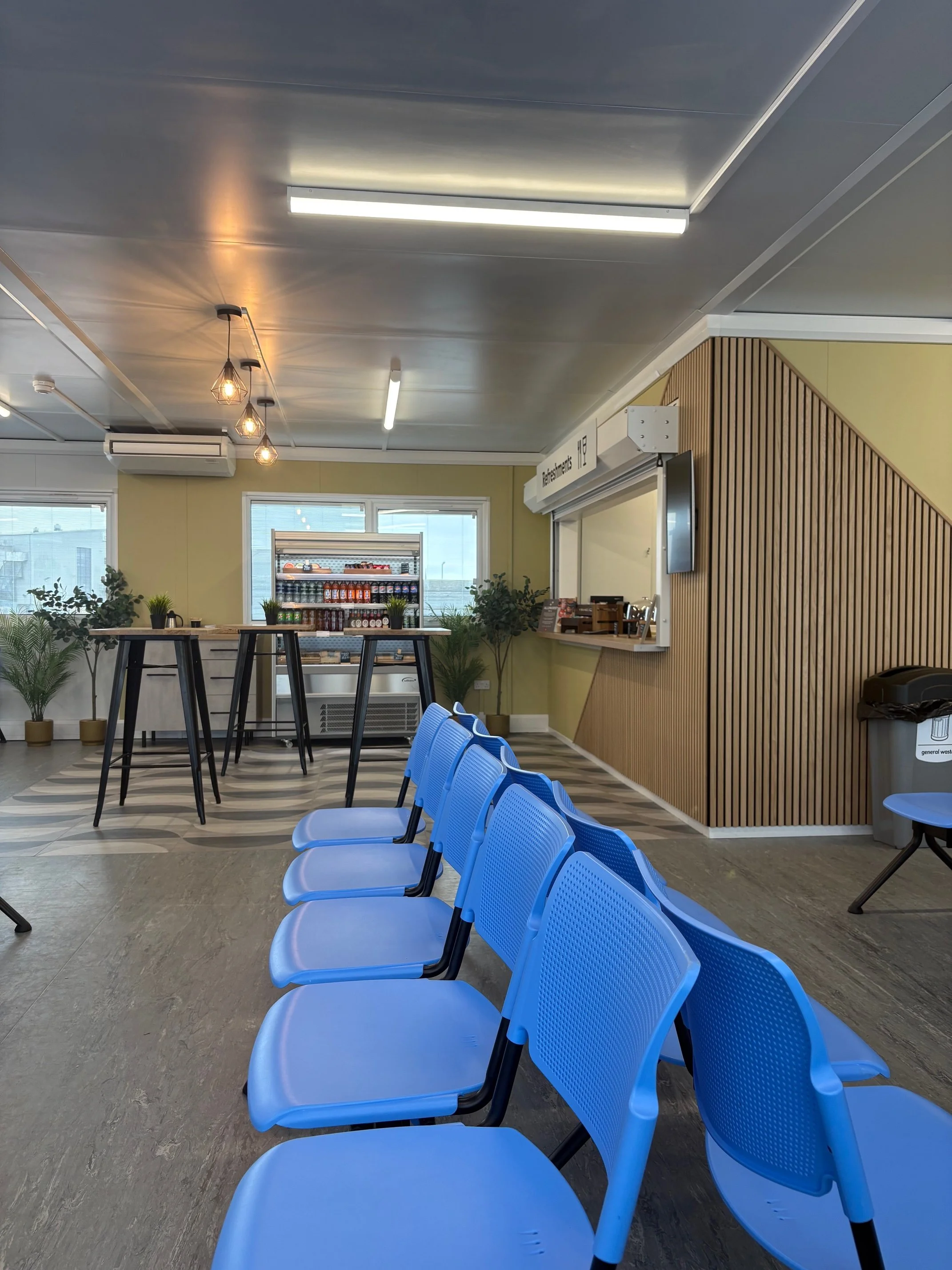 Waiting area with coffee kiosk