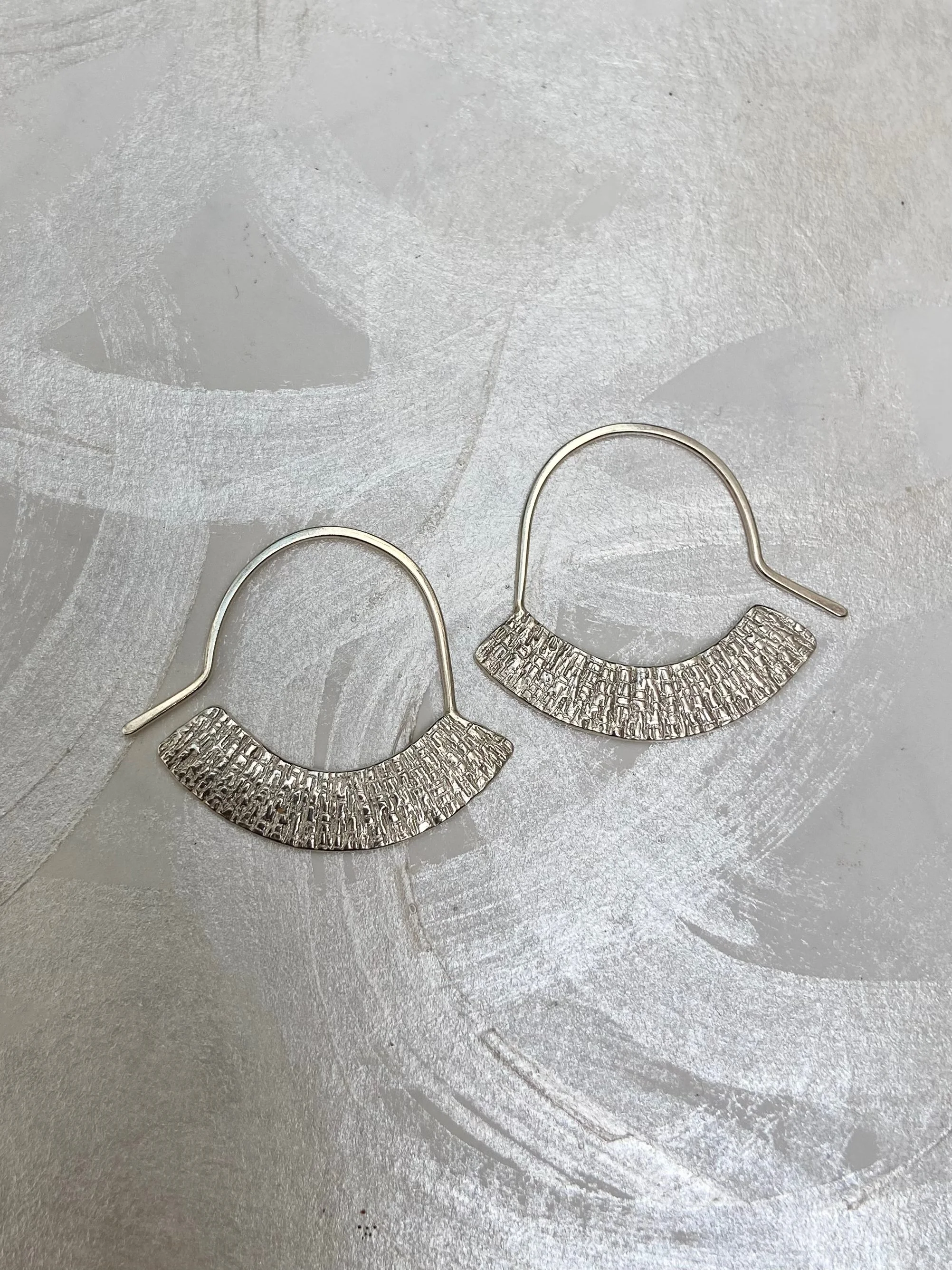 Stamped crescent hooks, Silver.