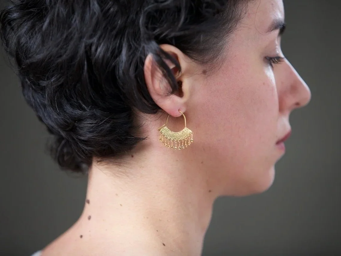 side-shot-of-model-wearing-14ct-gold-vermeil-chandelier-earrings-with-pyrite-beads.jpg