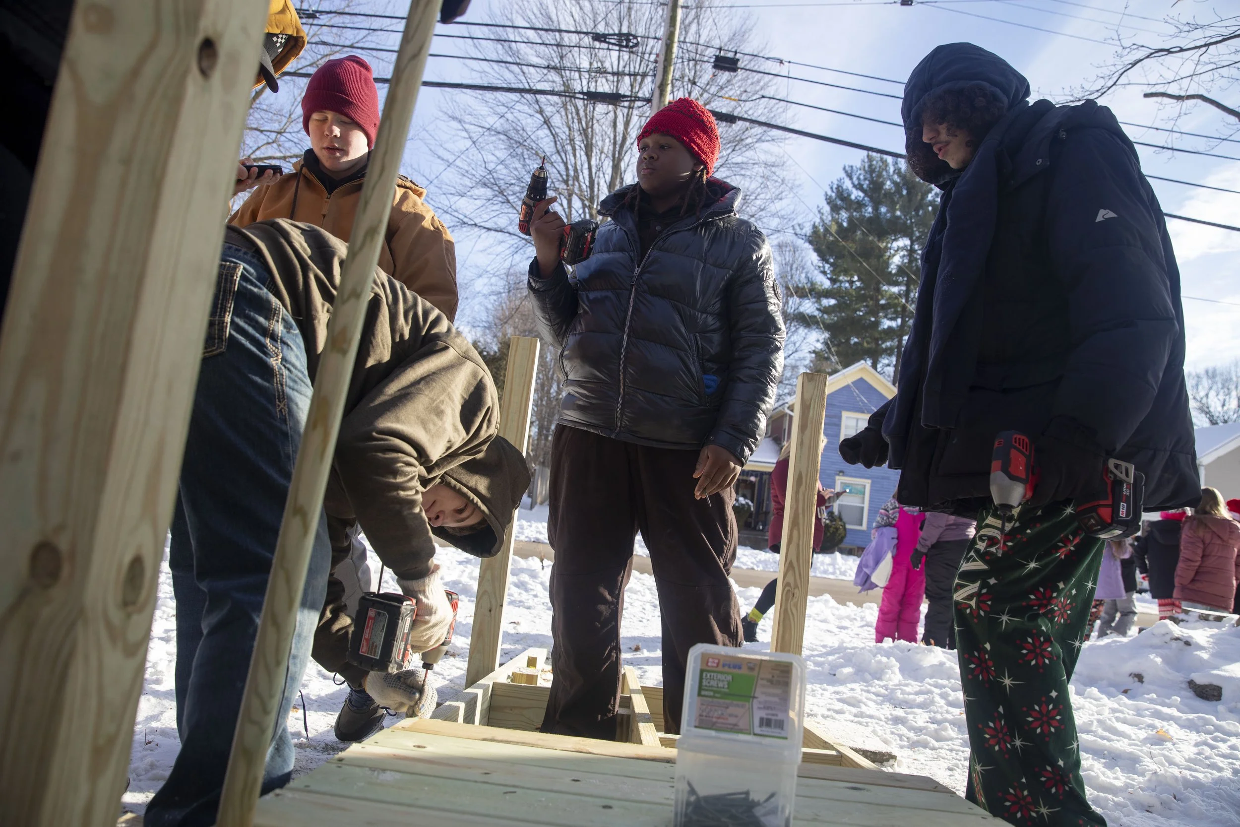 Concord Middle School students work on building a ramp for a student's father who became disabled after a crash a year ago. Mike Arbuckle, an industrial arts teacher at Concord Middle School lead the project and installment outside of the home on S. 