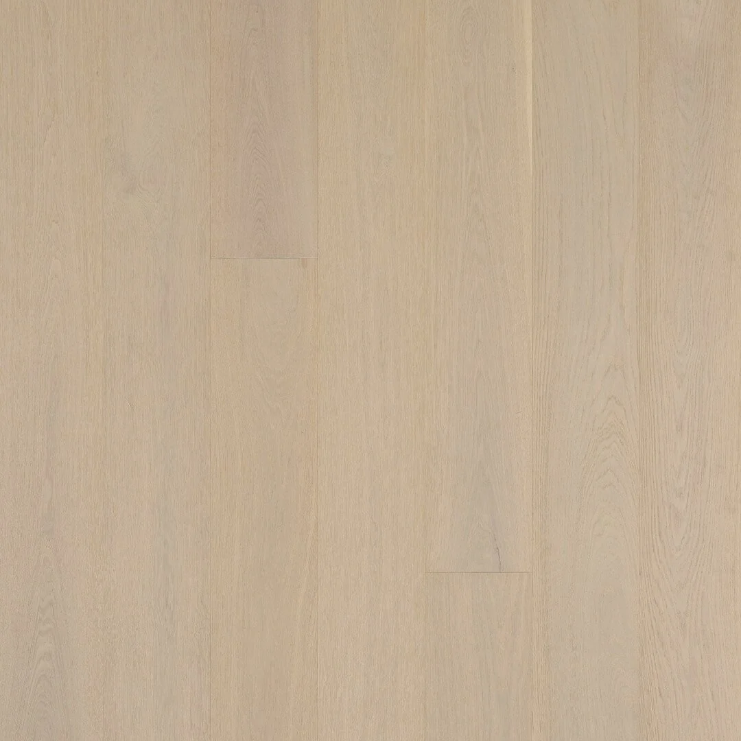 Light-colored wooden flooring with a smooth finish and visible wood grain.