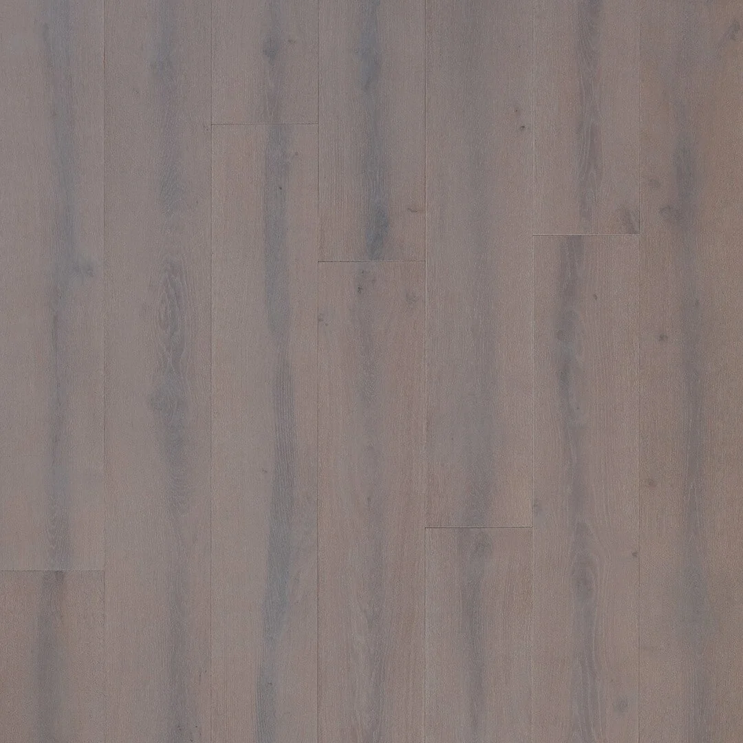 Close-up of light-colored wooden floorboards with visible grains and knots.
