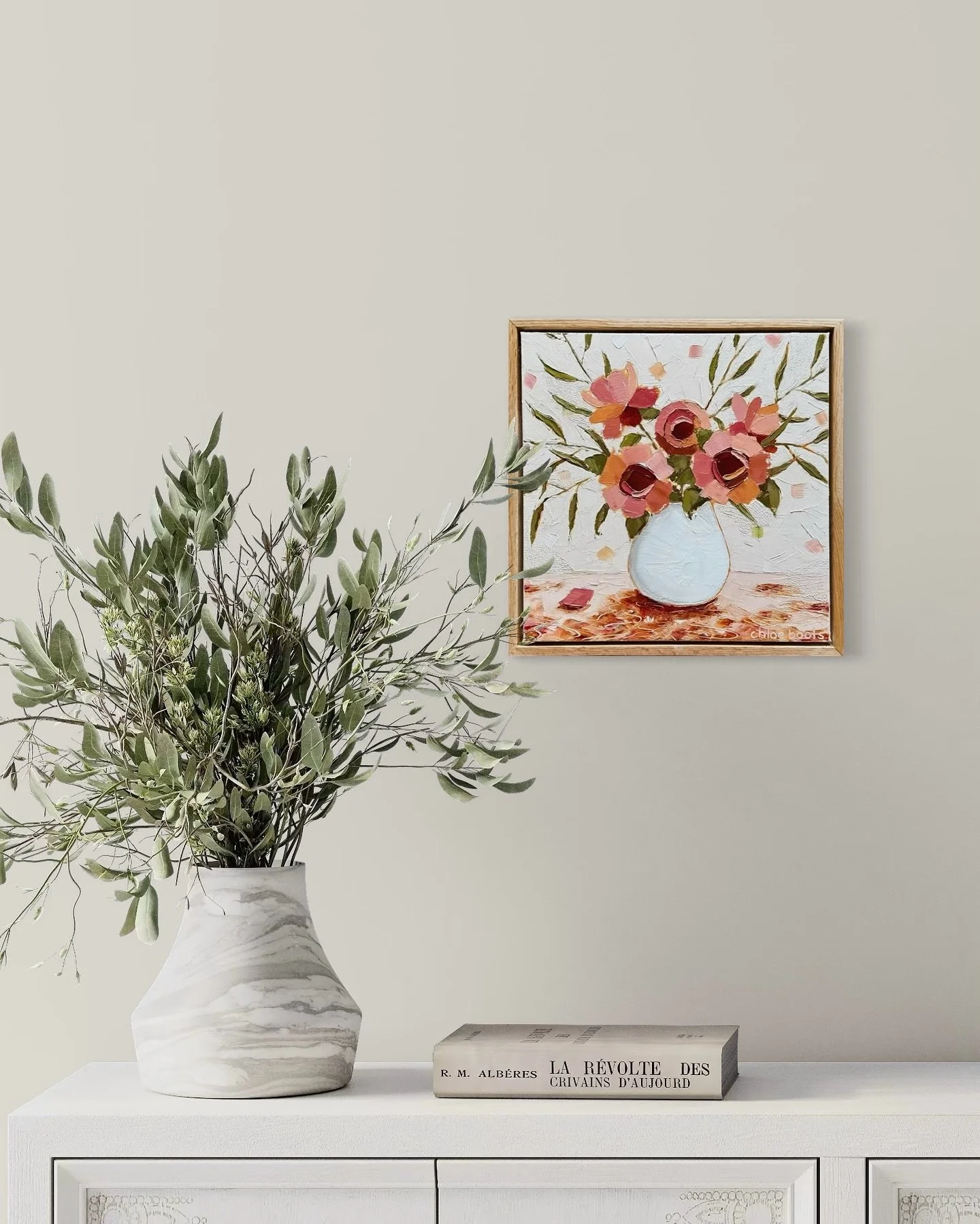 &ldquo;A Rustic Arrangement&rdquo; is an expressive floral painting featuring oranges, pinks, browns, burgundy and olive on a neutral beige background. Created with a palette knife and bold brushstrokes this striking piece adds colour, character and 