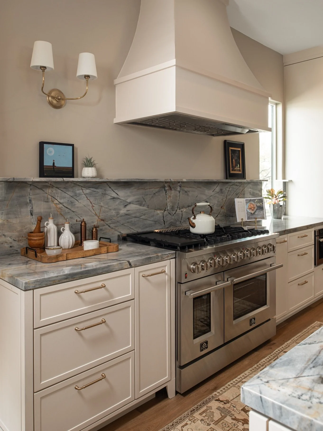 A stone that steals the show 🪩 We can never resist the beauty of Ijen Blue. With a smoky blue body and striking rust and gold veining, it&rsquo;s the kind of slab you build entire spaces around.