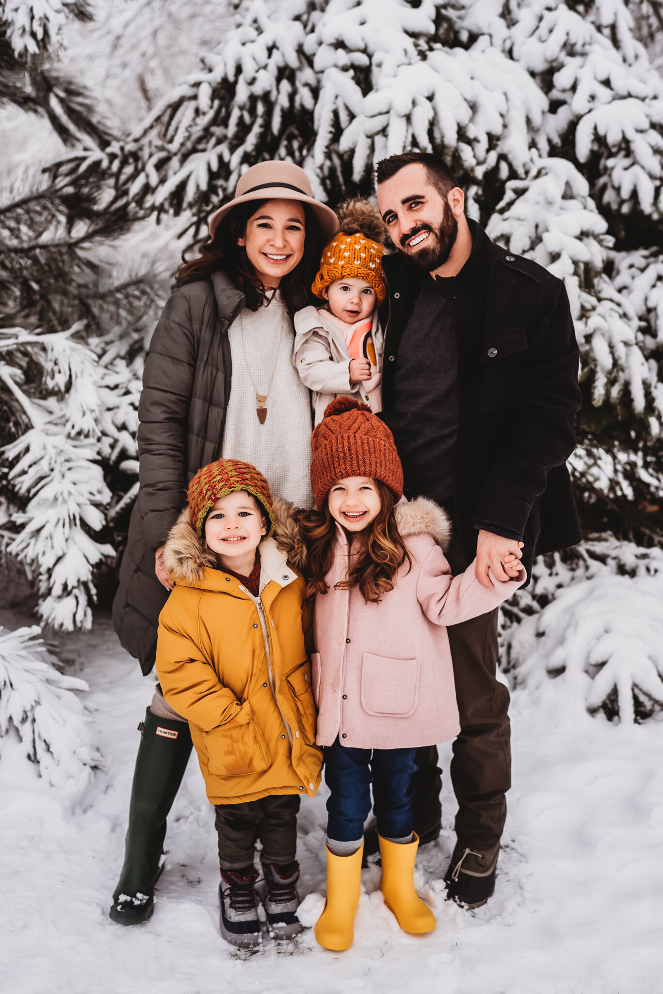 Family stand in the snow central illinois family photographer