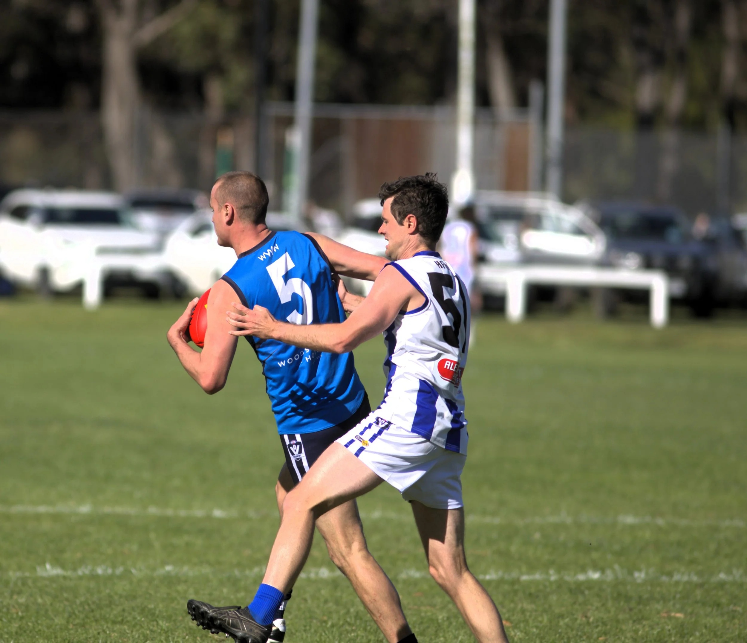 Wildcats hold firm in windswept opener 