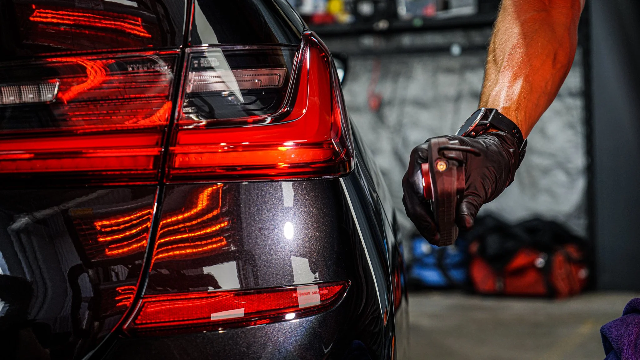 Assessing paint condition during a paint correction at Thomas Mayer Automotive Detailing