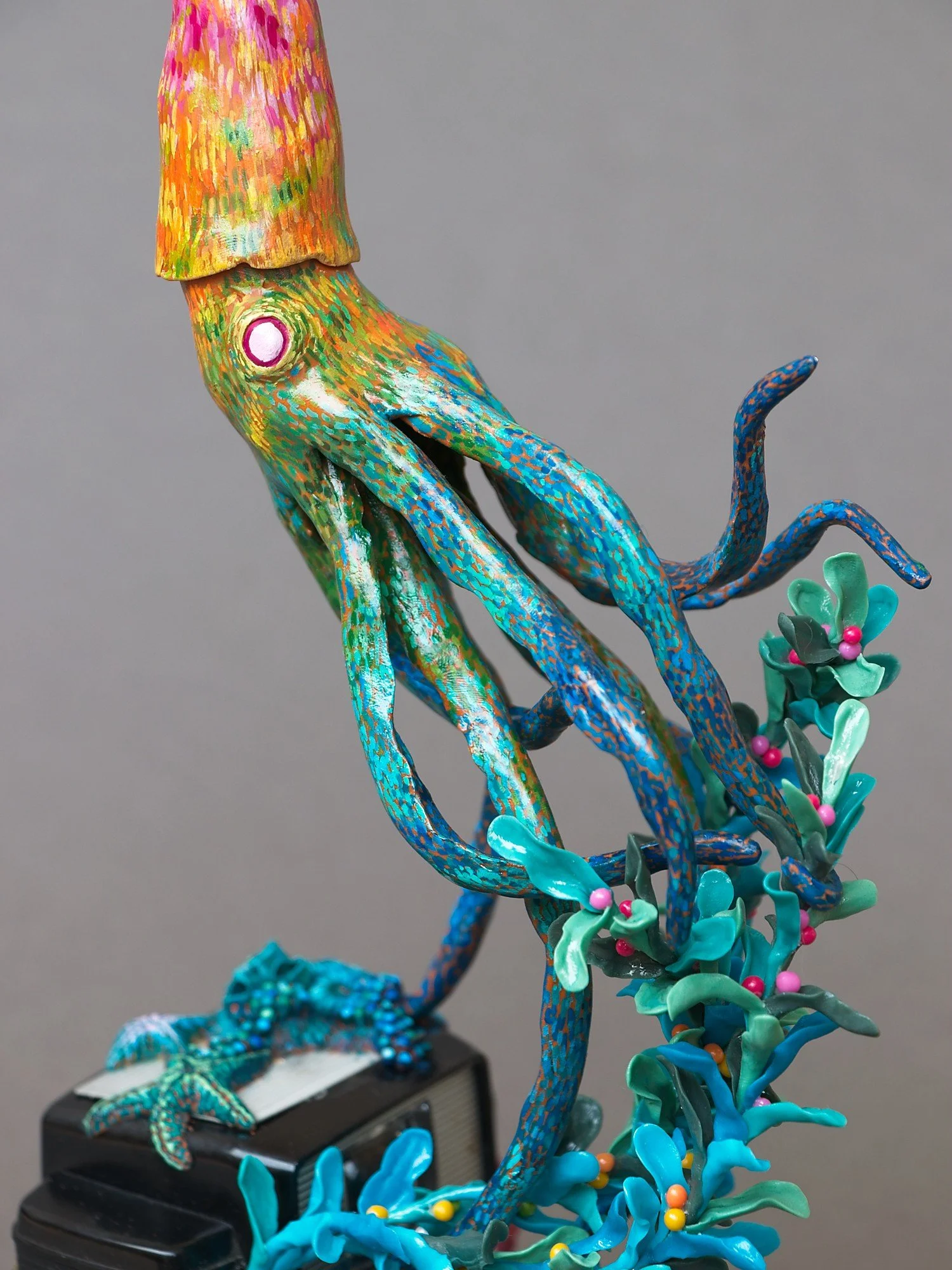 Festive Squid, Miniature Squid Sculpture on Vintage Kodak Camera, 2026, Stephanie Kilgast