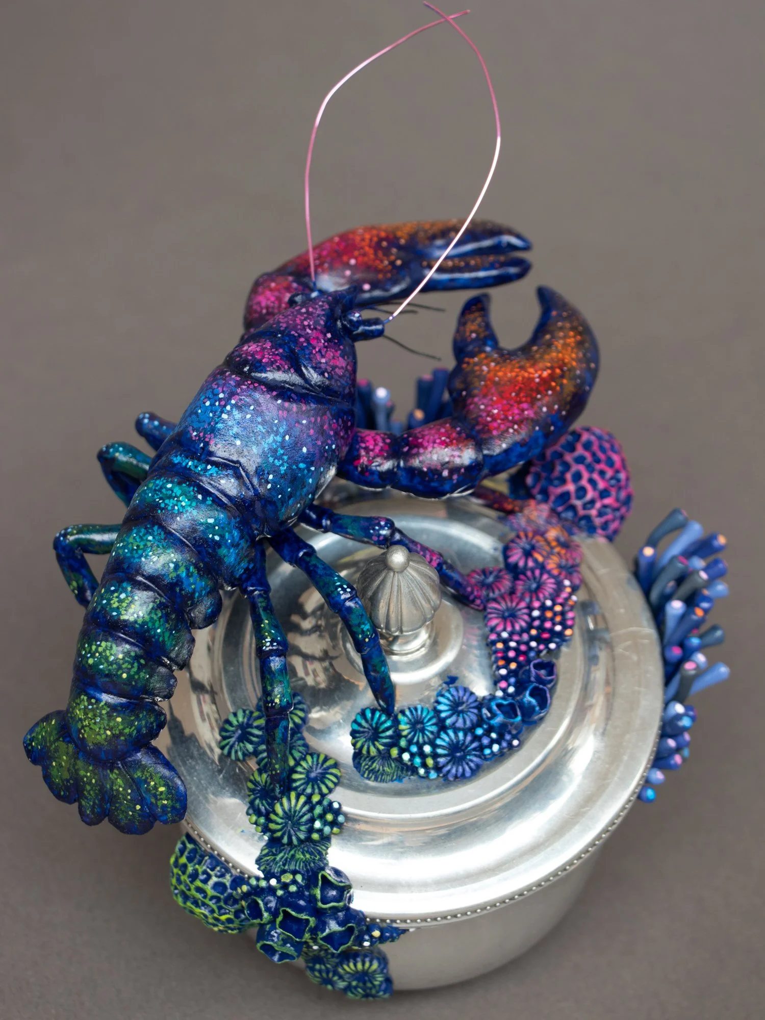 Eternal Youngster, Mixed Media Coral and Lobster Sculpture on Thrifted Navy Box, 2026, Stephanie Kilgast