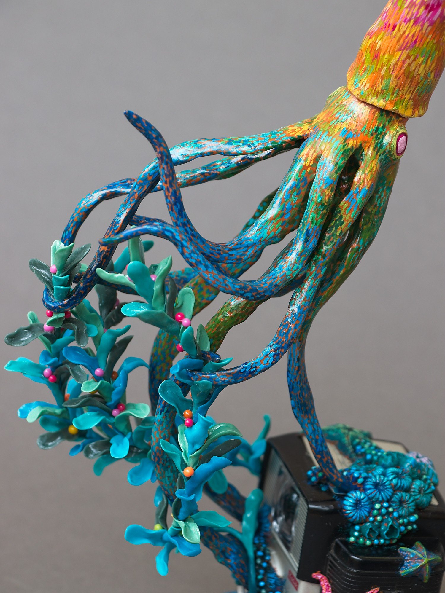 Festive Squid, Miniature Squid Sculpture on Vintage Kodak Camera, 2026, Stephanie Kilgast