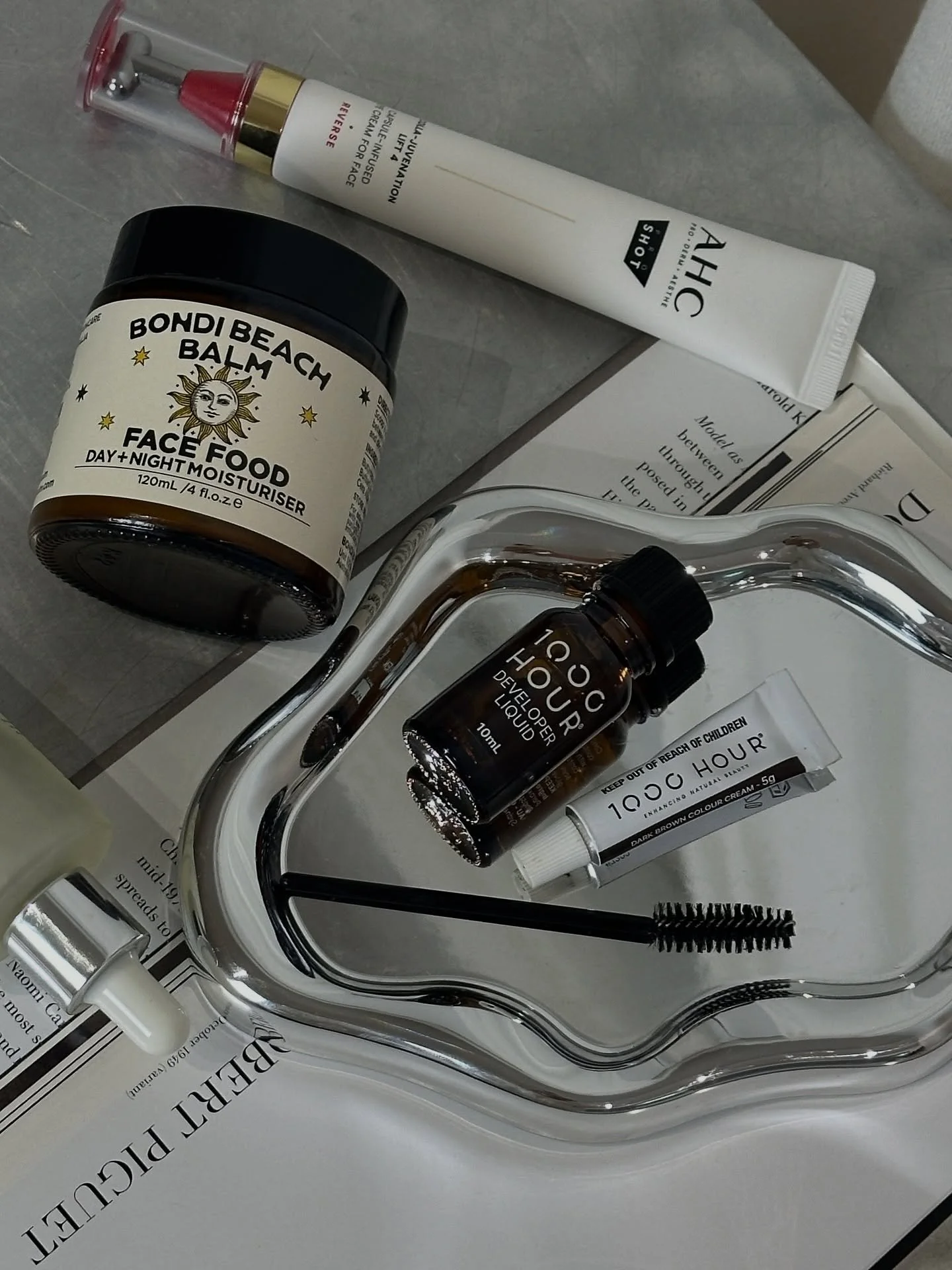 Flatlays captured in STUDIO ONE ✧.* 
With @1000hour 🪩

Eye cream: @ahc.australia 
Moisturiser: @bondibeachbalm