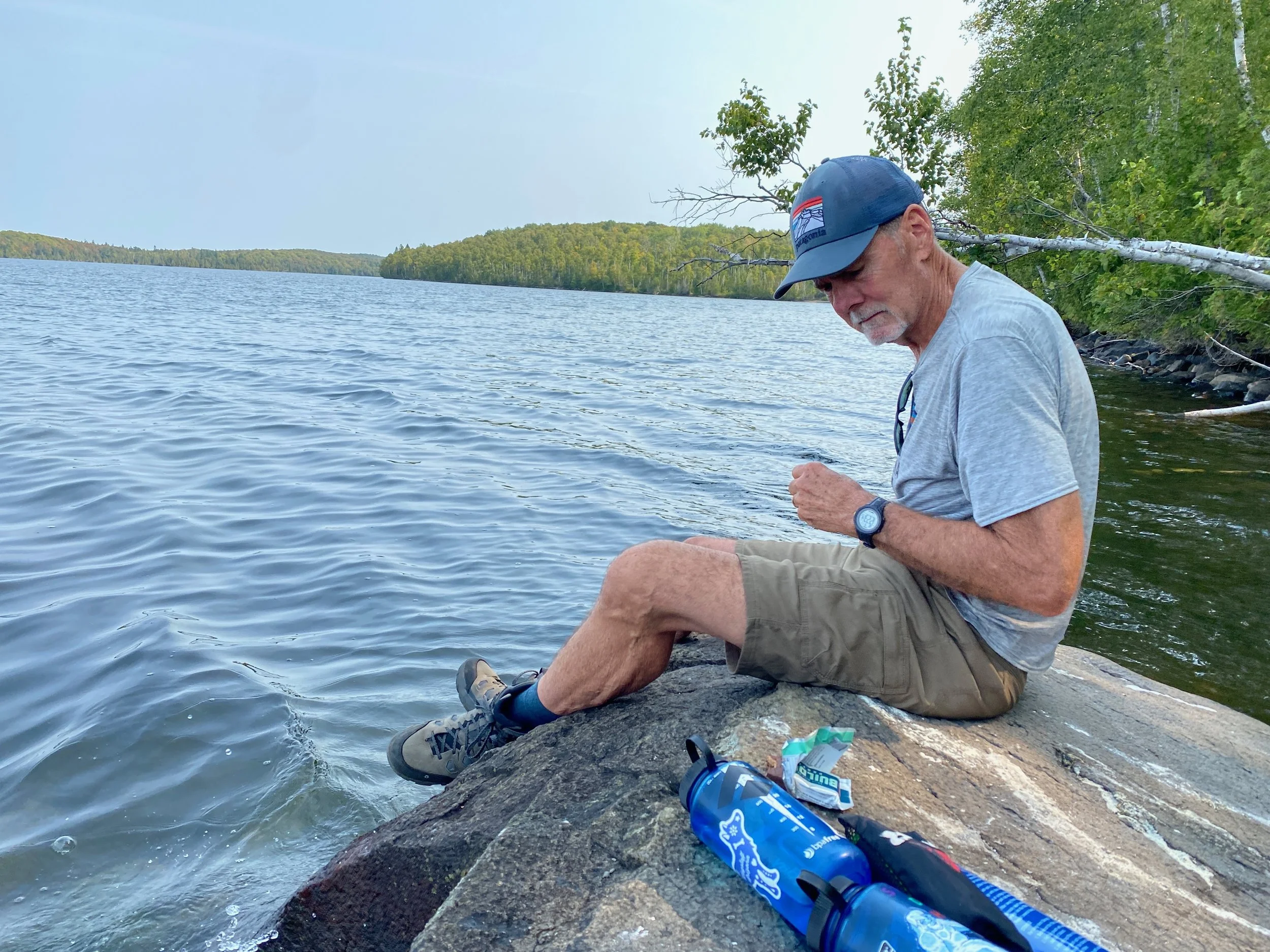 Doug on lake rock.jpeg