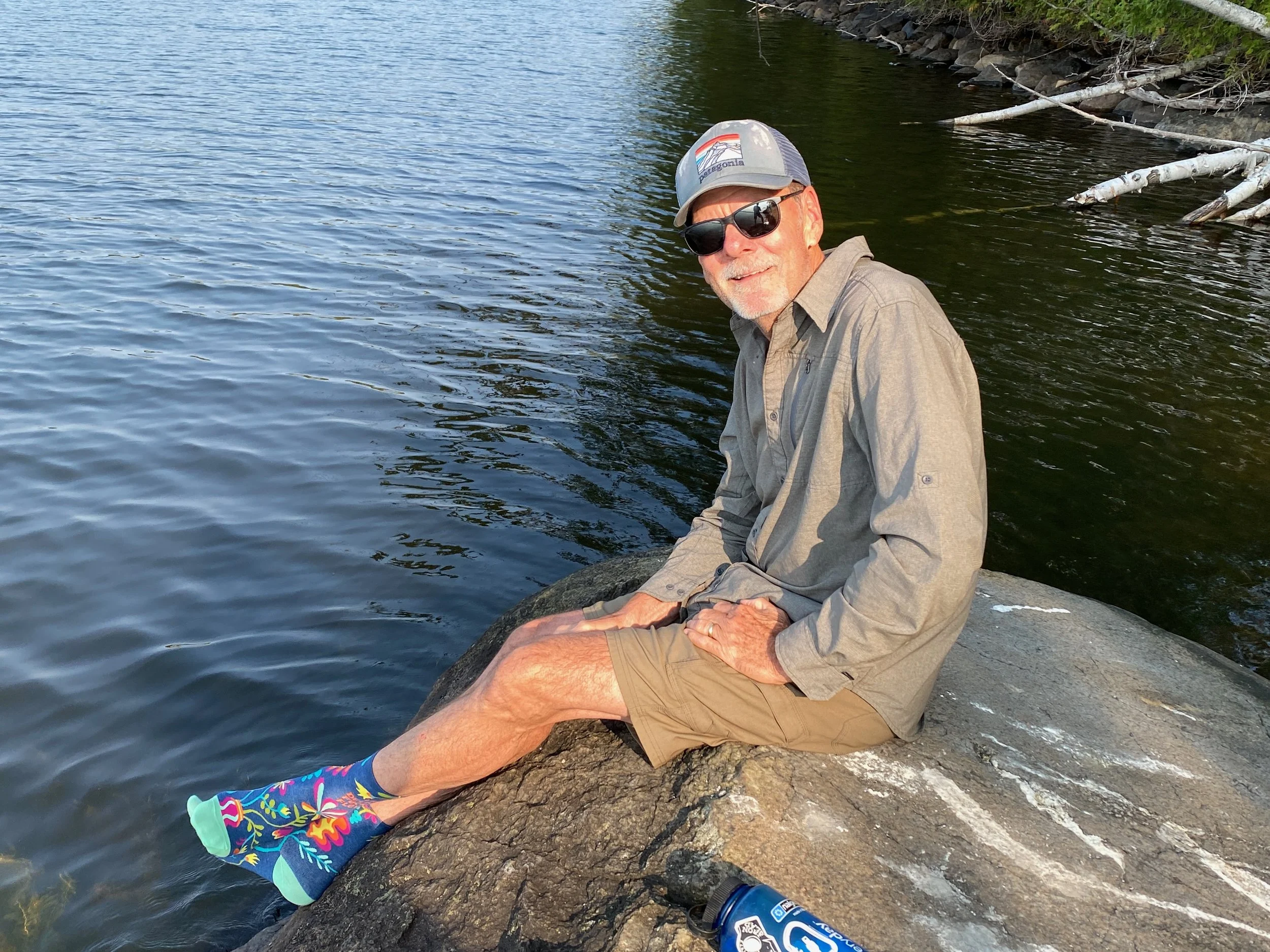 Doug on lake rock.jpeg