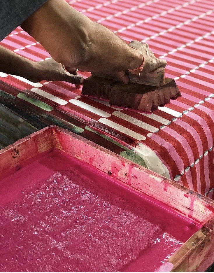 Pink Luna fabric being printed in India.jpg