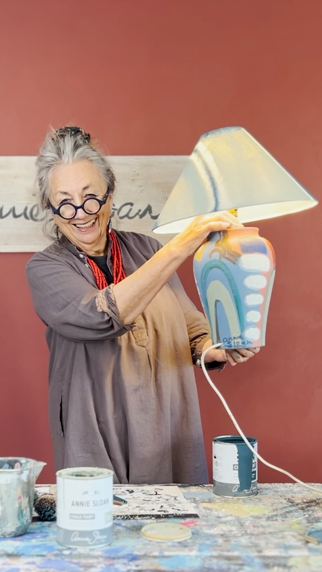 Annie Holding lampshade for katherine.png