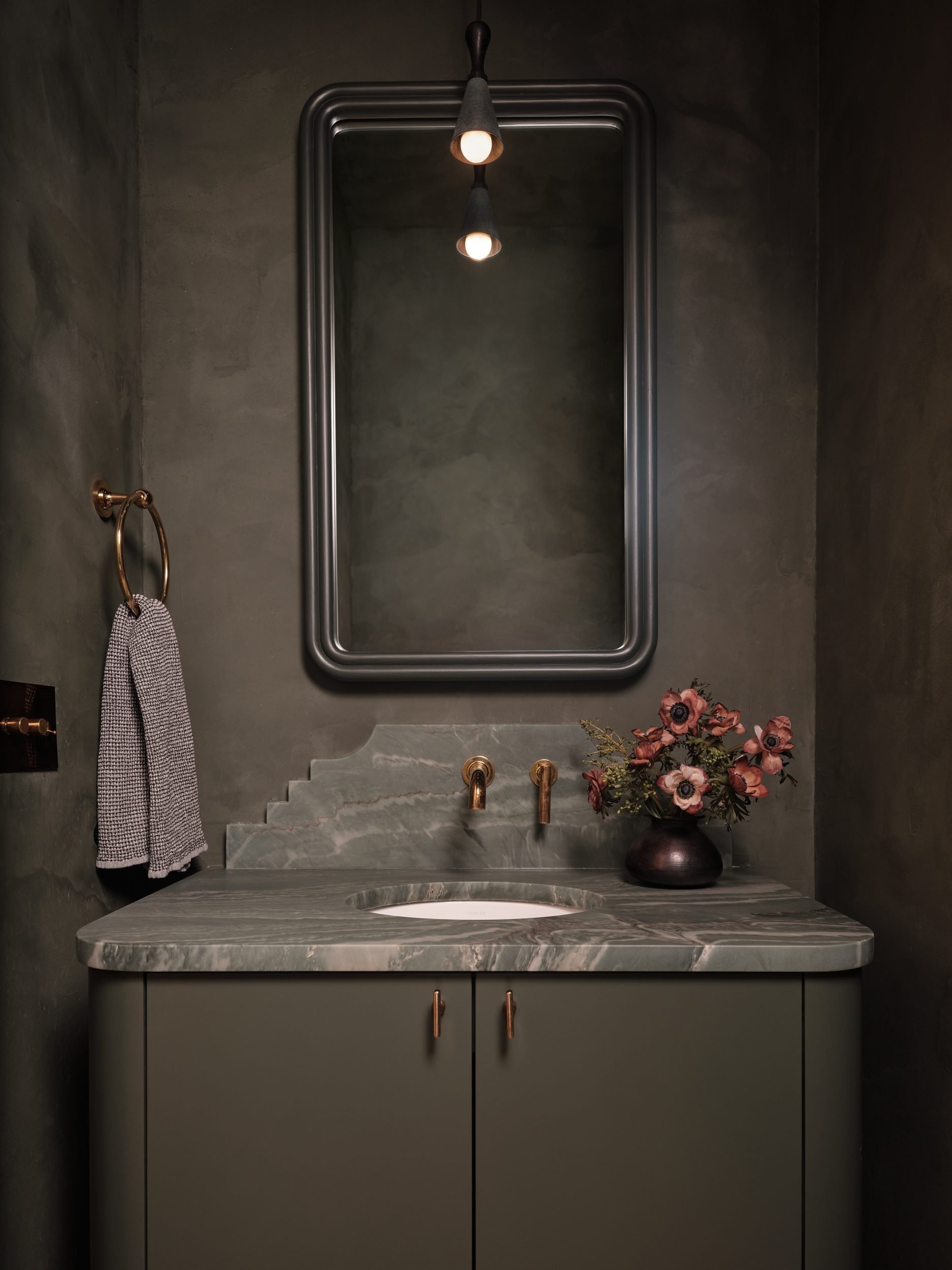 april-tomlin-interiors-compelling-restraint-powder-room-marble-vanity.jpg